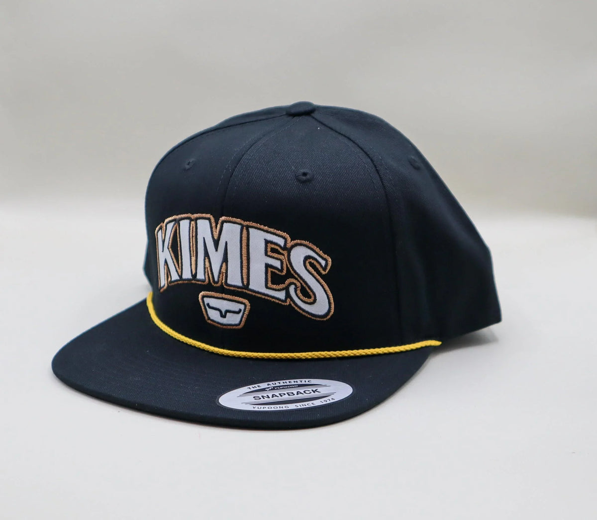 Kimes Ranch Kubo Black snapback hat with embroidered KIMES logo and yellow brim stitching