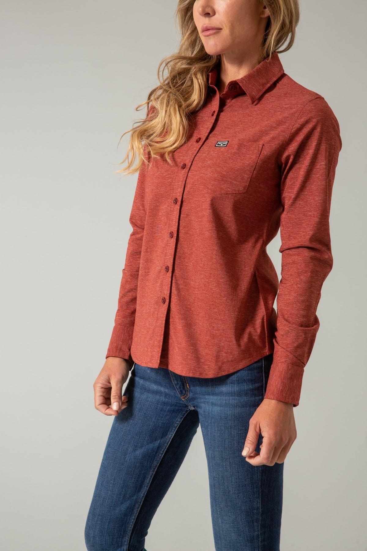 Kimes Ranch Ladies Linville long sleeve button-up shirt in Dark Red, side view, with a chest pocket and logo