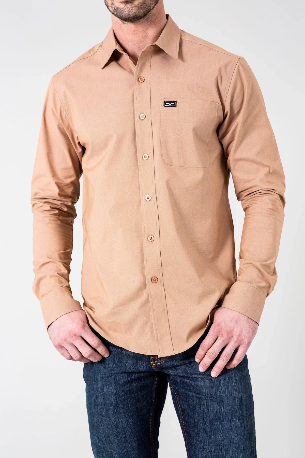 Kimes Ranch Linville Long Sleeve Dress Shirt in Desert Brown with a chest pocket and logo patch