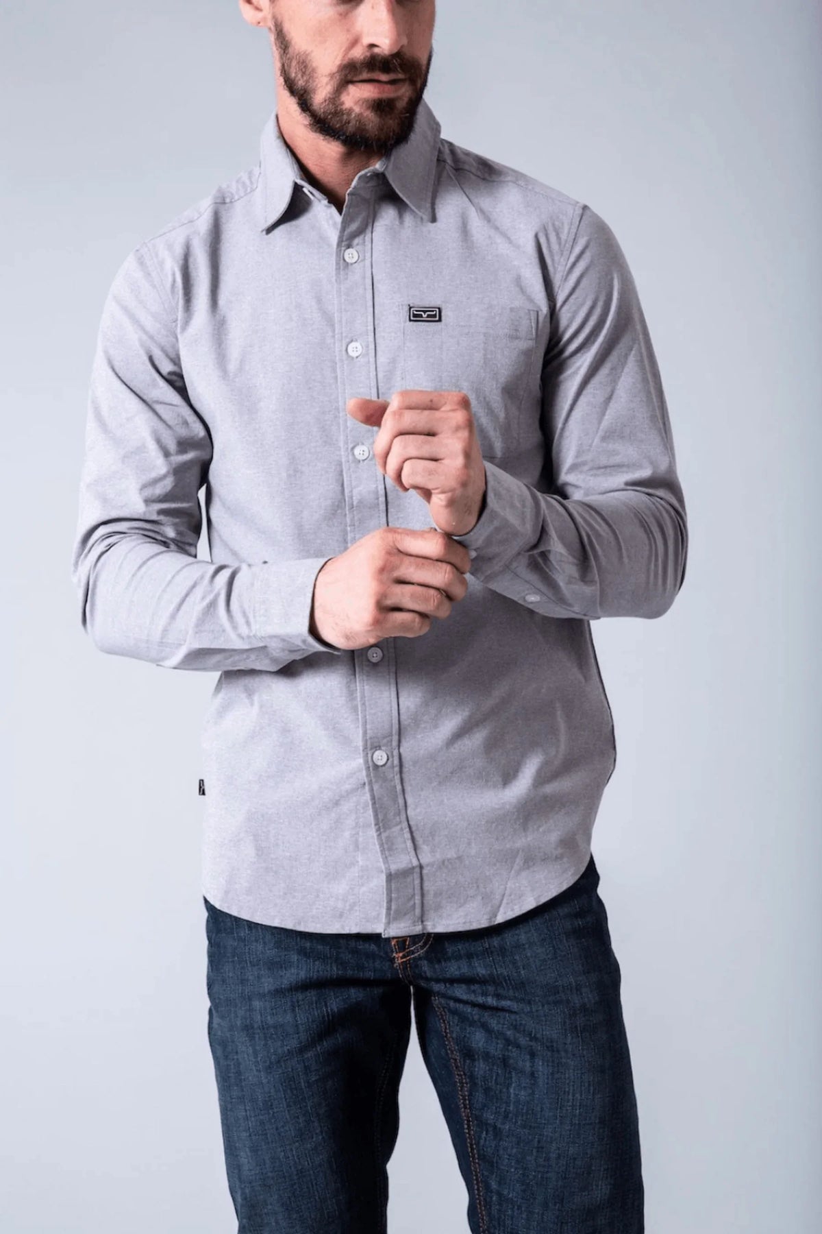 Kimes Ranch Linville Long Sleeve Dress Shirt in Grey Heather with a chest pocket and logo patch