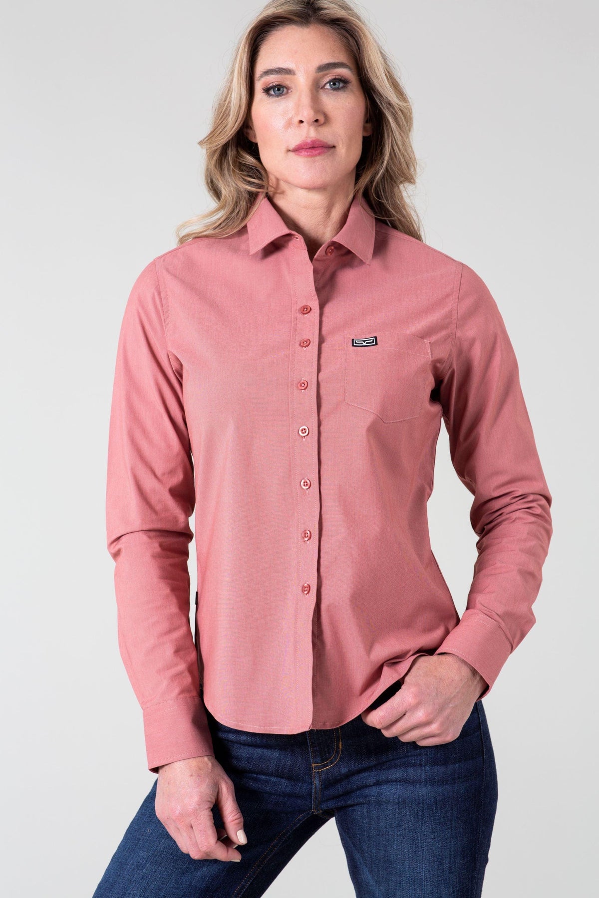 Kimes Ranch Ladies Linville long sleeve button-up top in Red with a chest pocket and logo patch