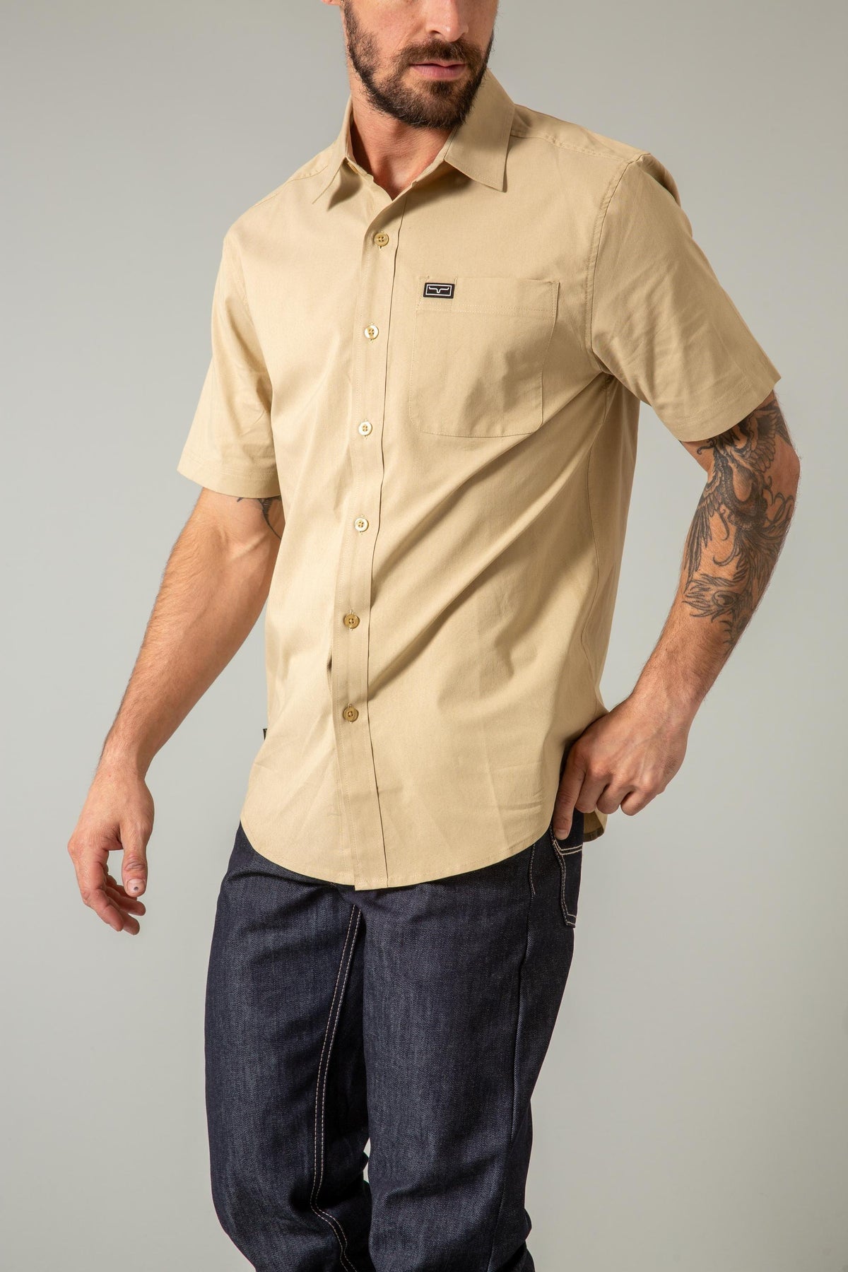 Kimes Ranch Linville Short Sleeve Dress Shirt in Khaki with a chest pocket and logo patch
