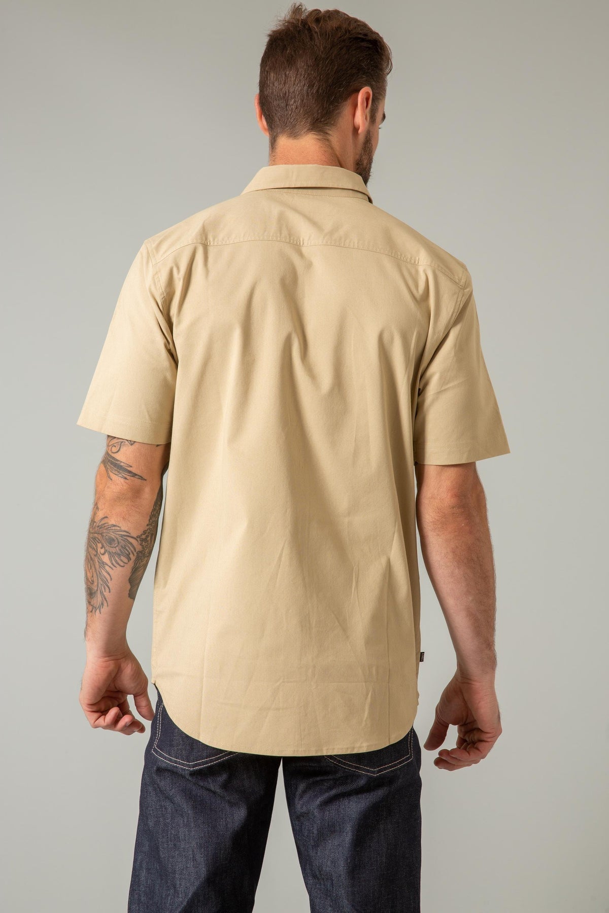 Kimes Ranch Linville Short Sleeve Dress Shirt in Khaki, back view, with a back yoke and short sleeves