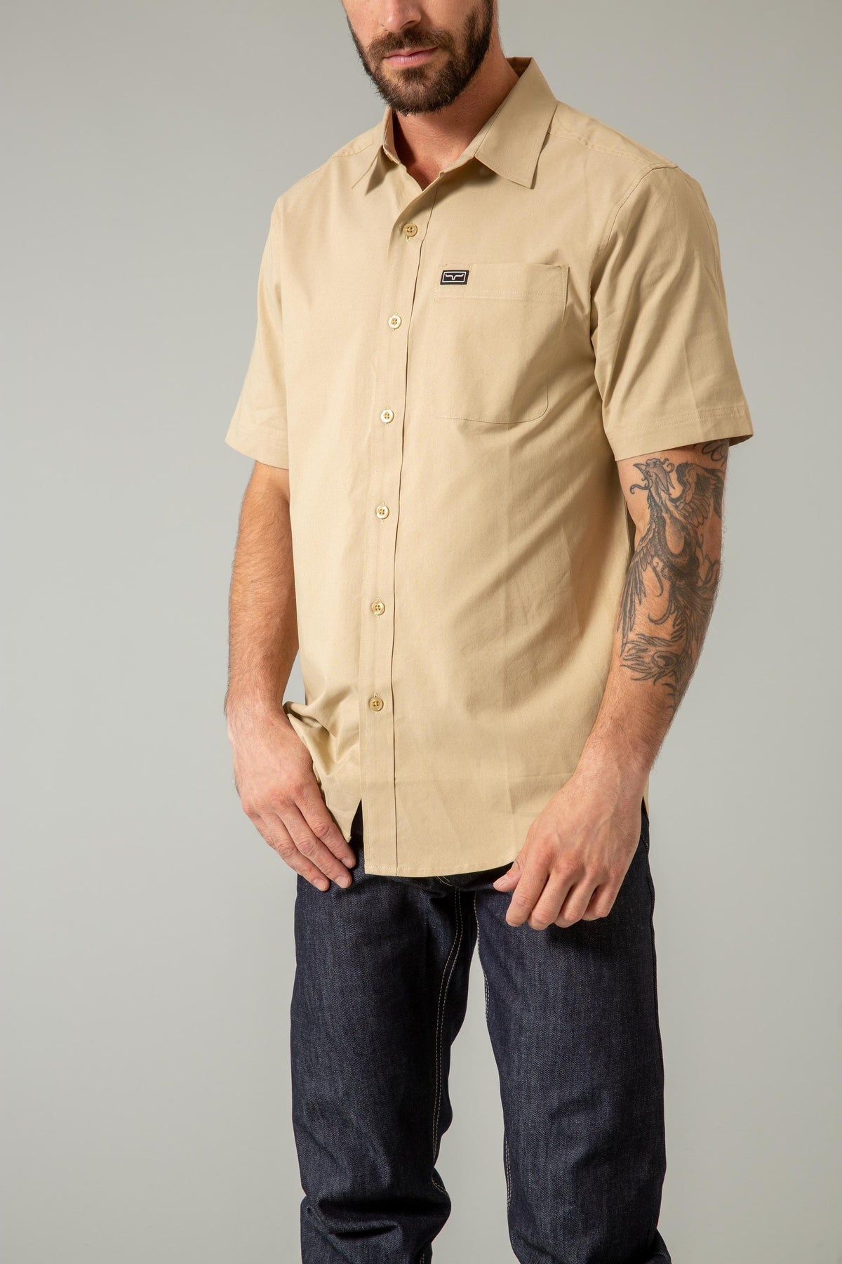 Kimes Ranch Linville Short Sleeve Dress Shirt in Khaki with a chest pocket and logo patch