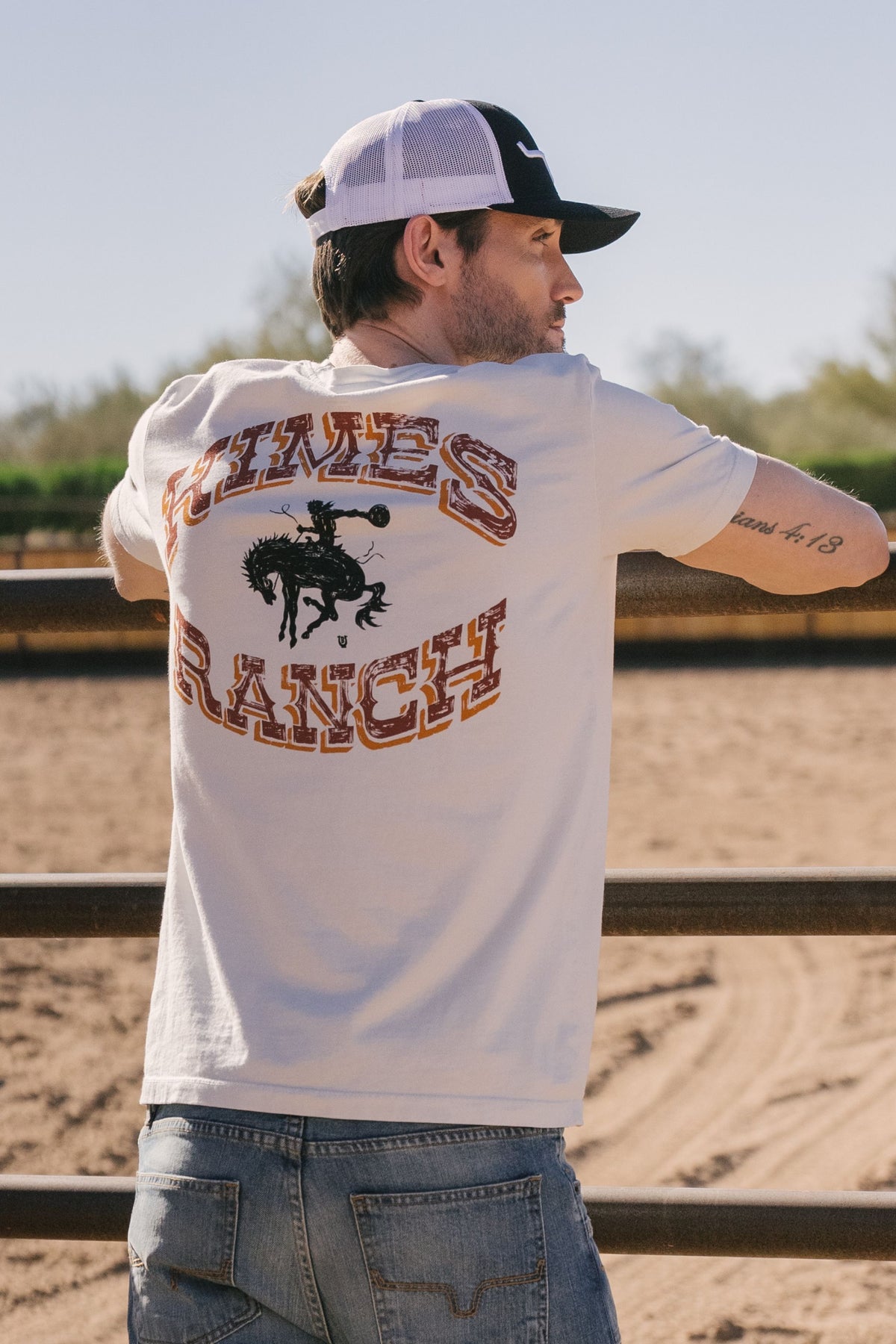Kimes Ranch Lucky B Bucking shirt in Natural, back view, with a back graphic of a cowboy on a bucking horse