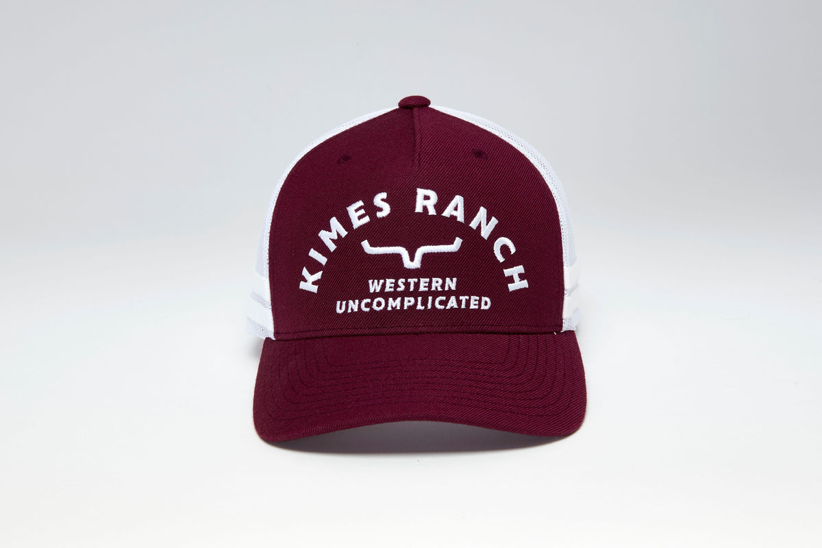 Kimes Ranch Cantor hat in Burgundy with white mesh back and embroidered Kimes Ranch logo with Western Uncomplicated text
