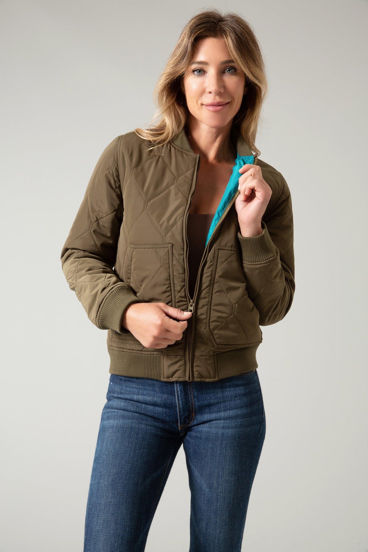 Kimes Ranch Marino Bomber Jacket in Dark Army with diamond quilting and teal lining