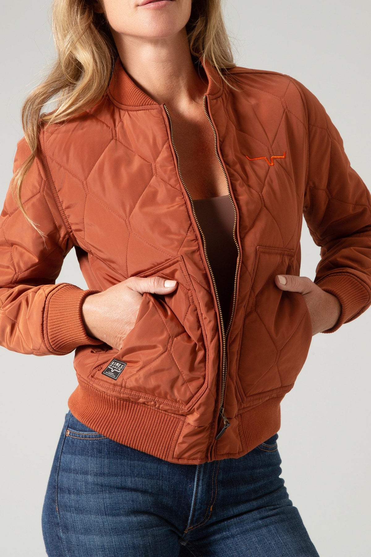 Kimes Ranch Marino Bomber Jacket in Dark Rust with diamond quilting and front pockets