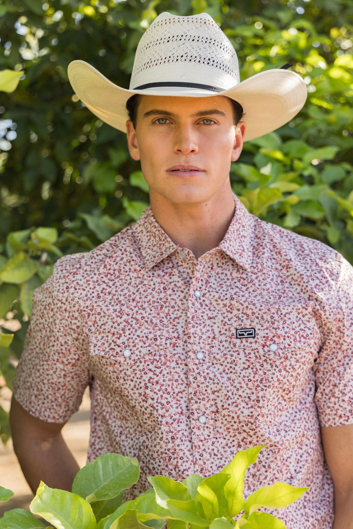 Kimes Ranch Bascom short sleeve dress shirt in Red with a small floral pattern and two chest pockets
