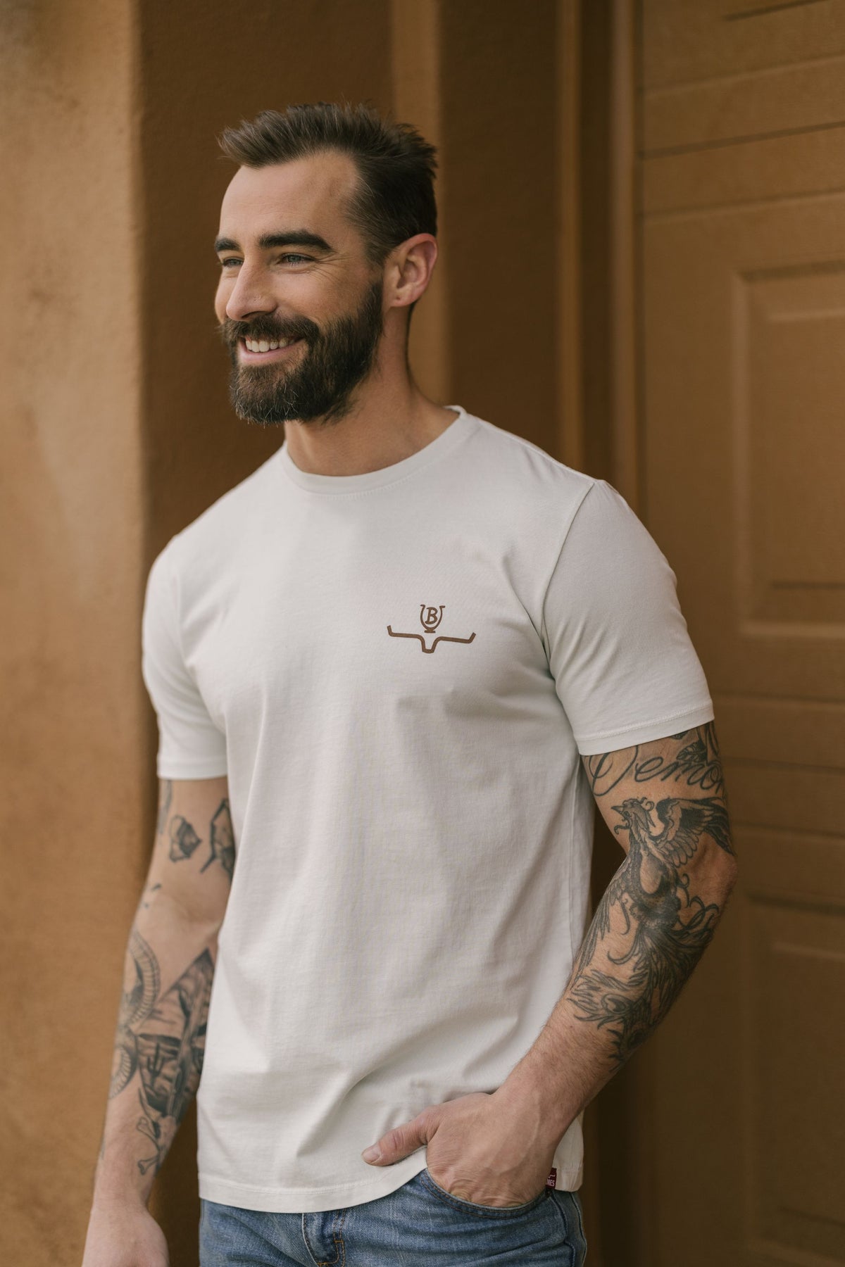 Kimes Ranch Lucky B Tuned shirt in Natural with a crew neck and chest logo