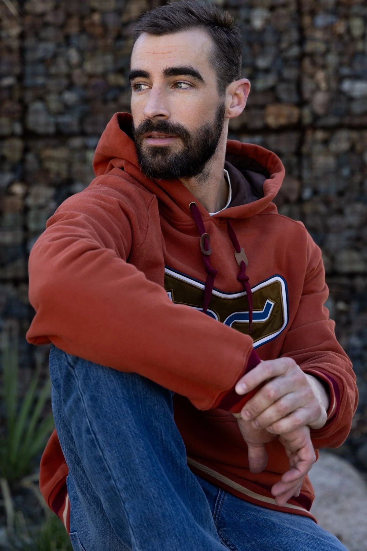 Kimes Ranch Cannons Hoodie in Brick Red with a large front graphic and maroon drawstrings