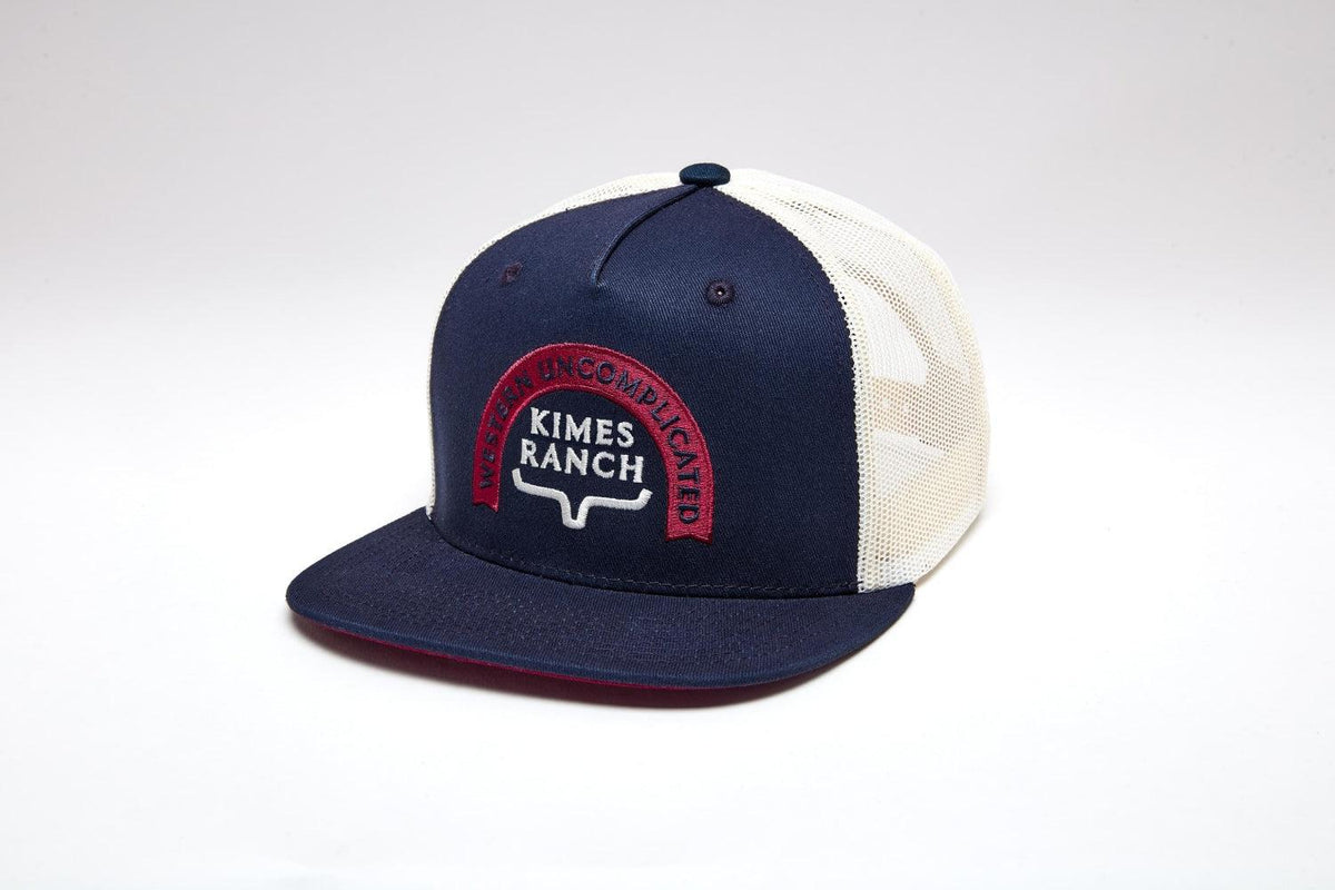 Kimes Ranch Newbury, side view, Navy trucker hat with mesh back and Western Uncomplicated logo