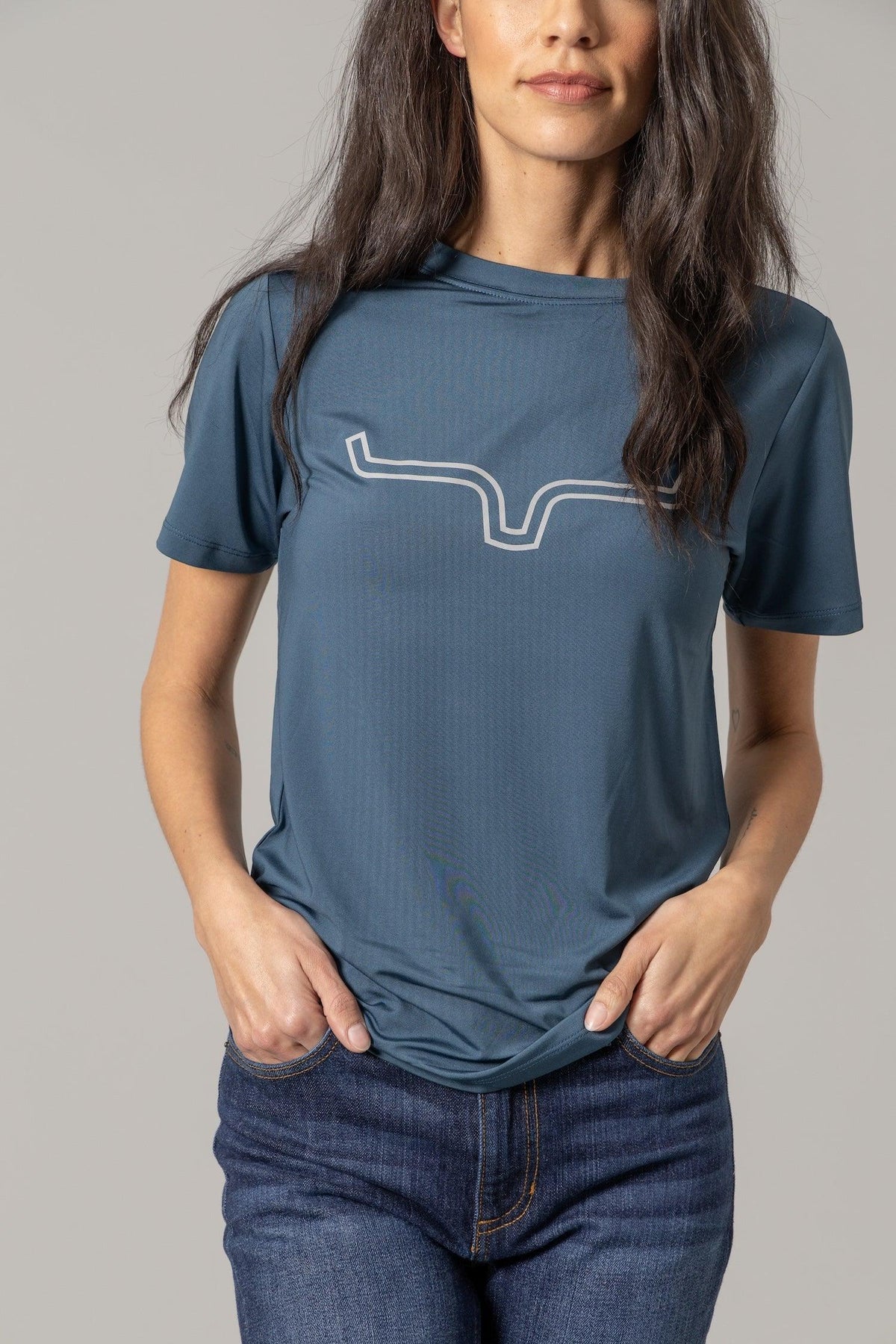 Kimes Ranch Ladies Outlier Tech Tee Shirt in Major Blue with a white outline steer logo on the chest