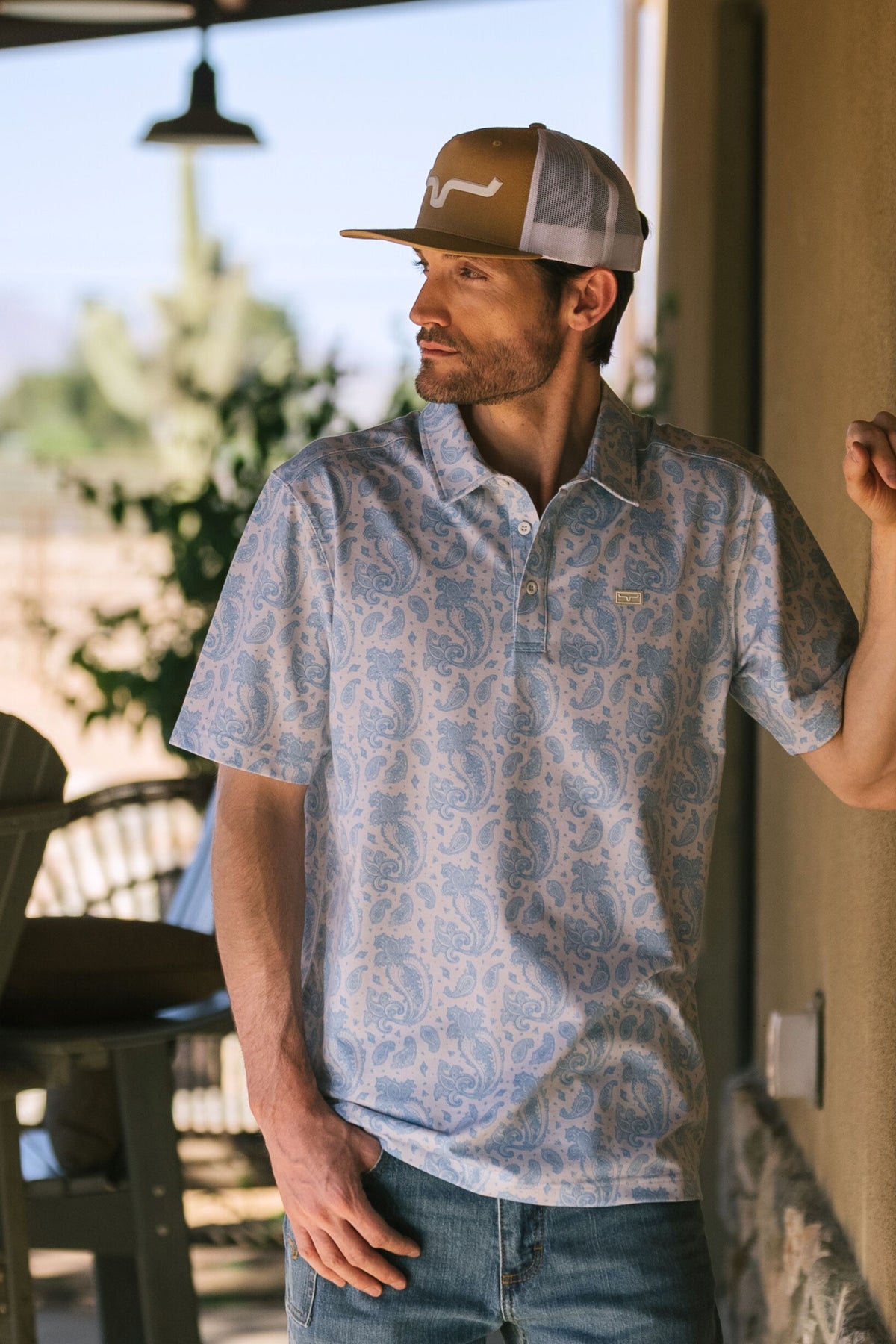 Kimes Ranch Burel polo in Blue with an all-over paisley print and a small logo on the chest