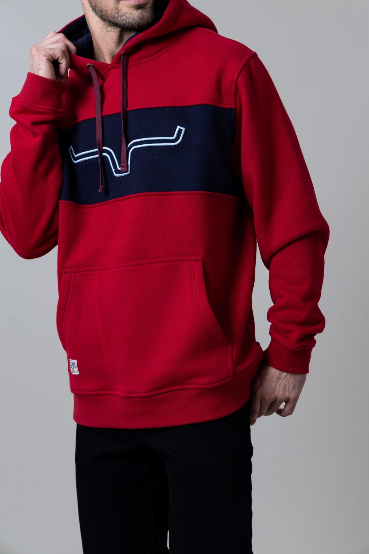Kimes Ranch Ripon Hoodie in Red with a navy chest stripe and white logo with a kangaroo pocket