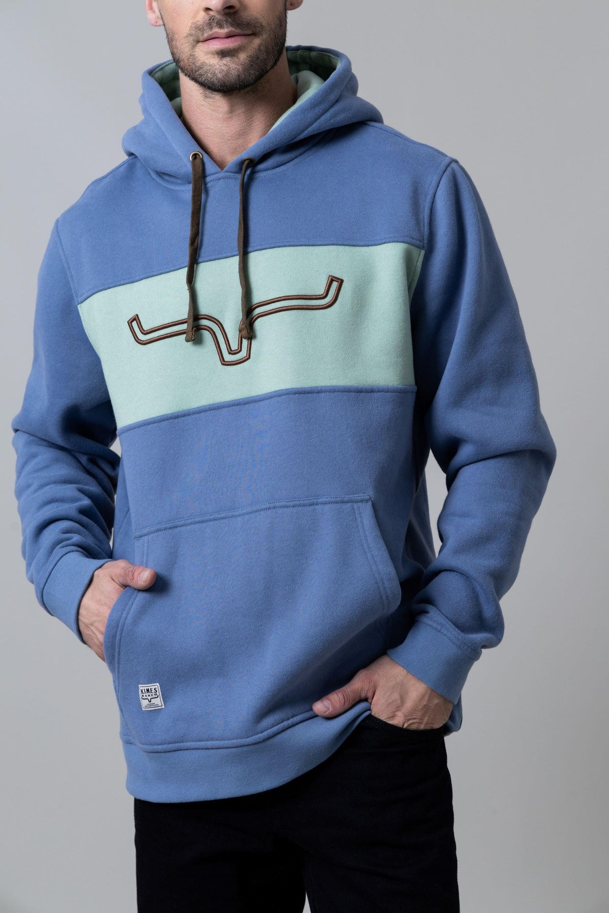 Kimes Ranch Ripon Hoodie in Slate Blue with a mint green chest panel and embroidered Kimes Ranch logo