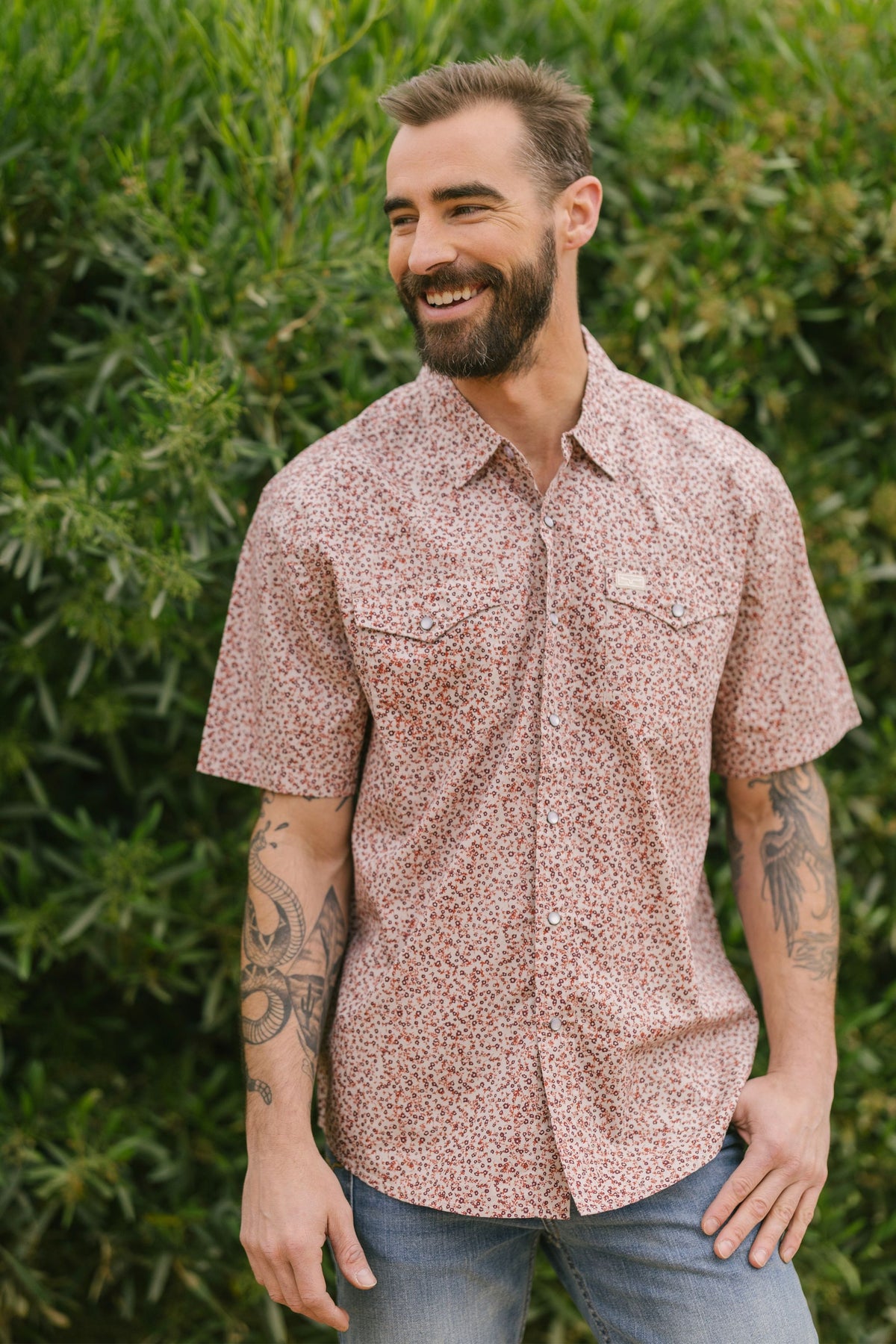 Kimes Ranch Bascom short sleeve dress shirt in Red with a small floral print and two chest pockets