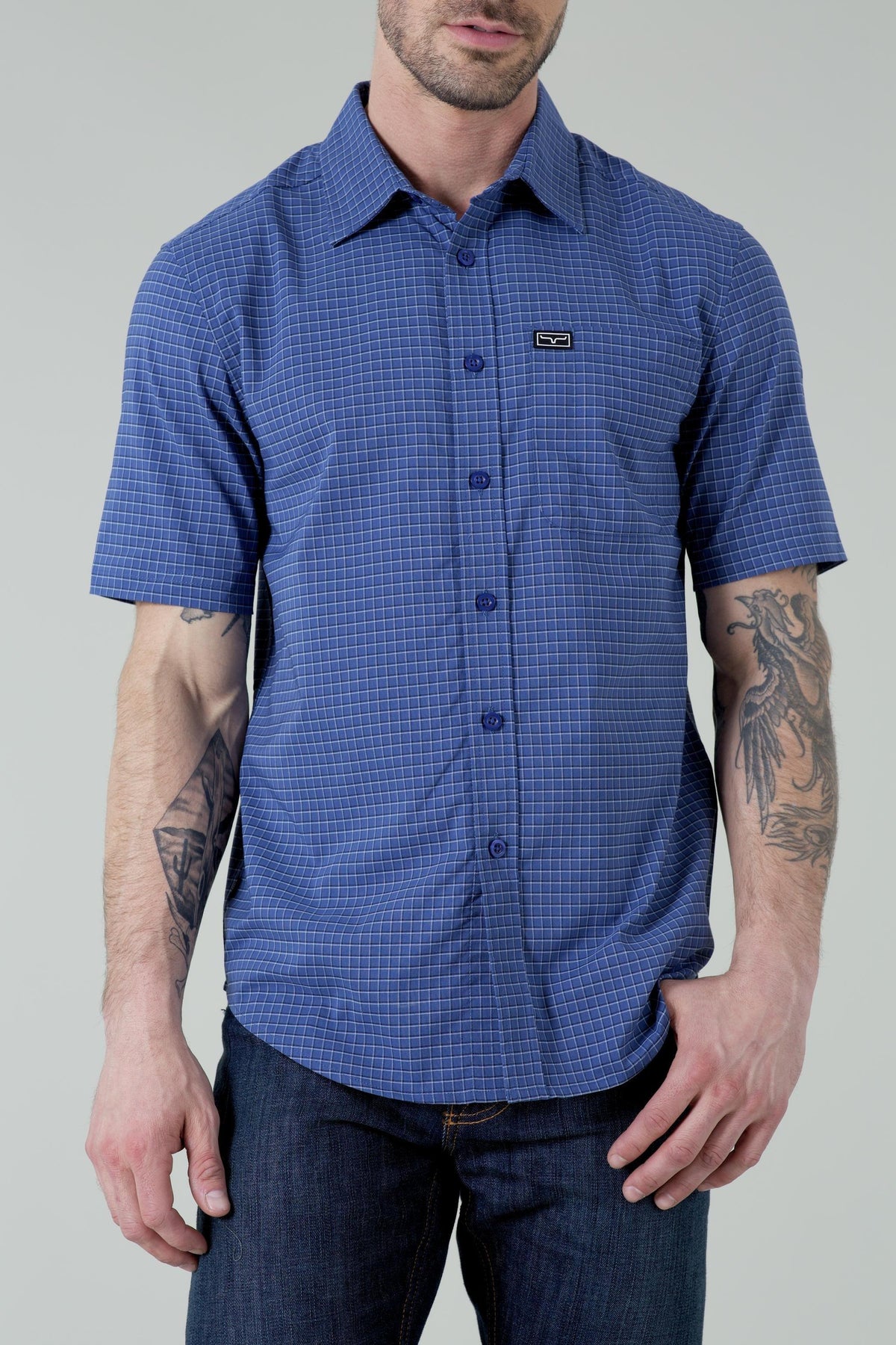 Kimes Ranch Spyglass Short Sleeve Dress Shirt in Blue with a grid pattern and chest pocket