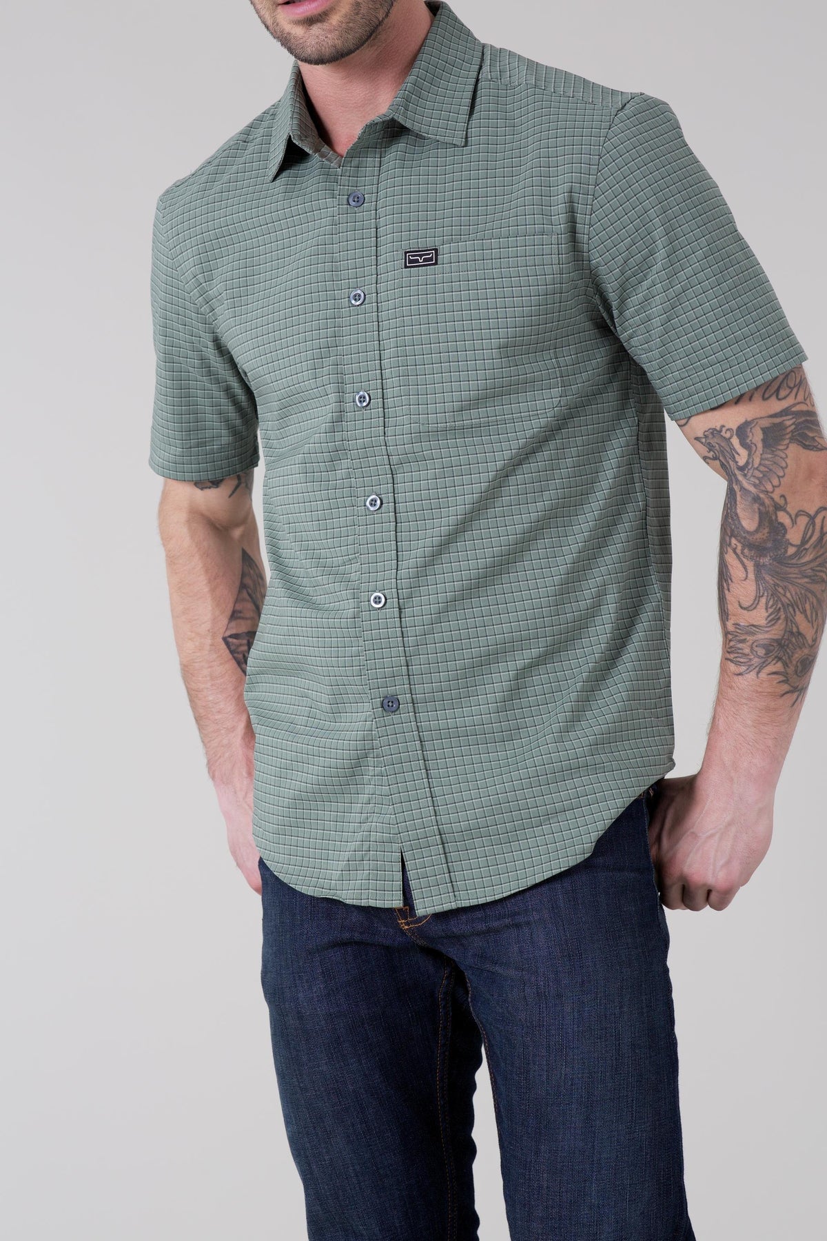 Kimes Ranch Spyglass Short Sleeve Dress Shirt in Sage with a check pattern and chest pocket