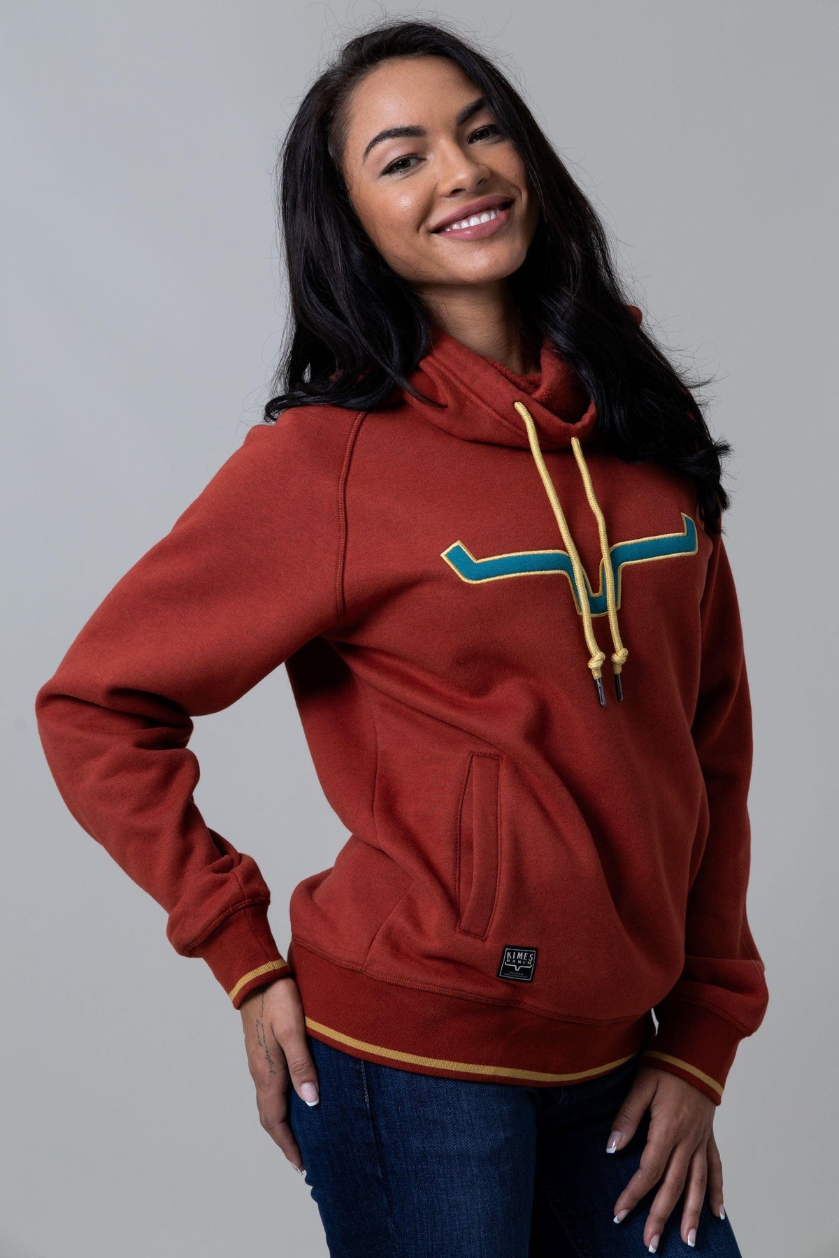 Kimes Ranch Two Scoops Hoodie in Rust with a teal and gold logo and gold drawstrings