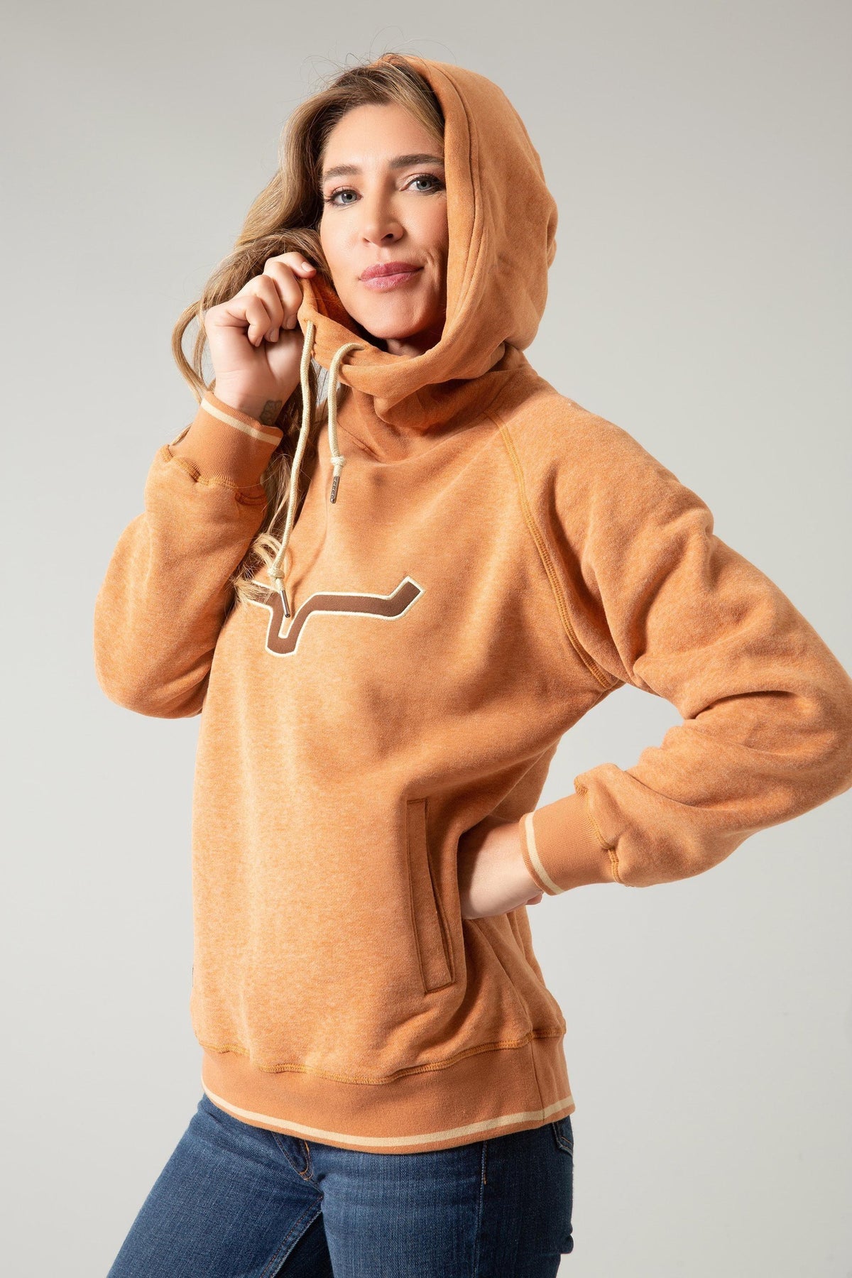 Kimes Ranch Two Scoops Hoodie in Rusty Heather, side view, with a front kangaroo pocket and a stylized steer logo