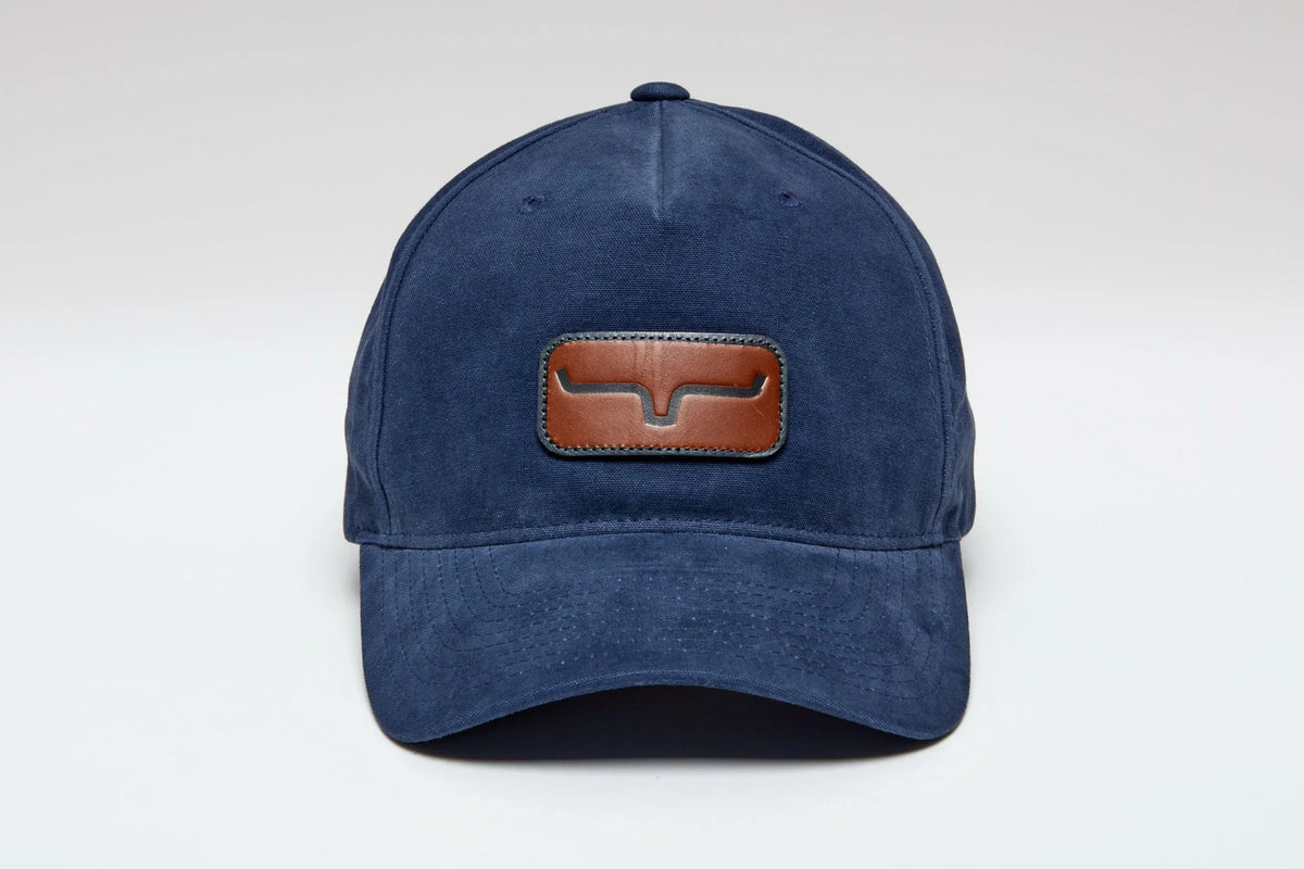 Kimes Ranch Vanguard Hat in Carbon Blue with a Kimes Ranch logo patch on the front