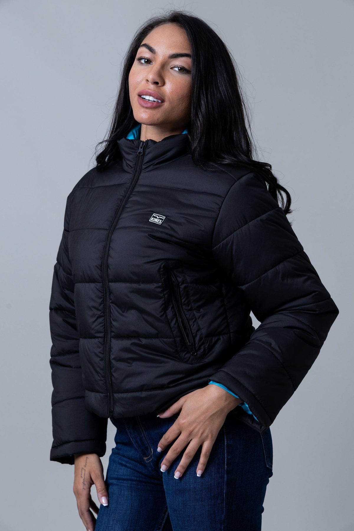 Kimes Ranch Valencia Puffy jacket in Black with a front zip and logo patch