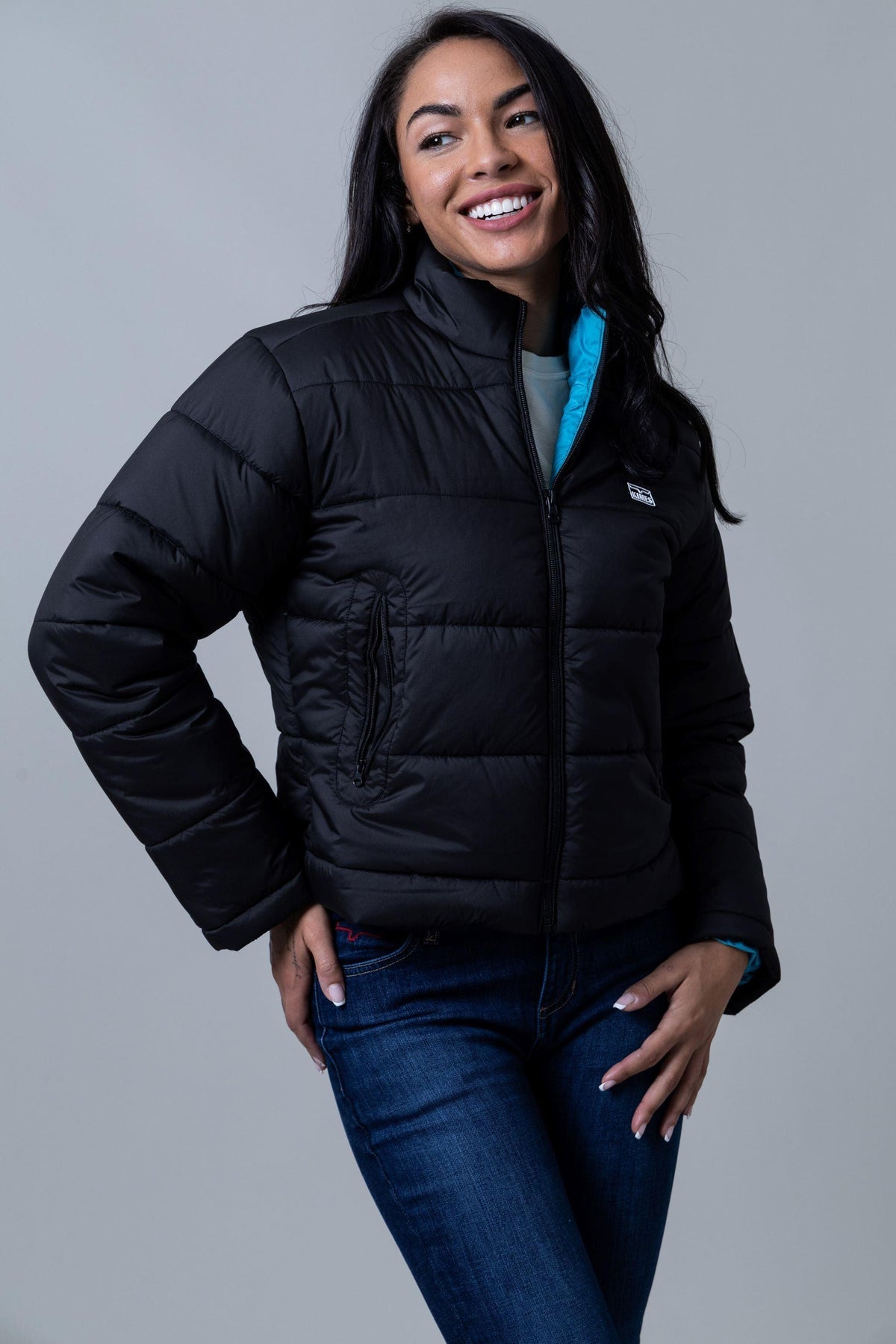 Kimes Ranch Valencia Puffy jacket in Black with a stand collar, zip front, side pockets and a blue lining