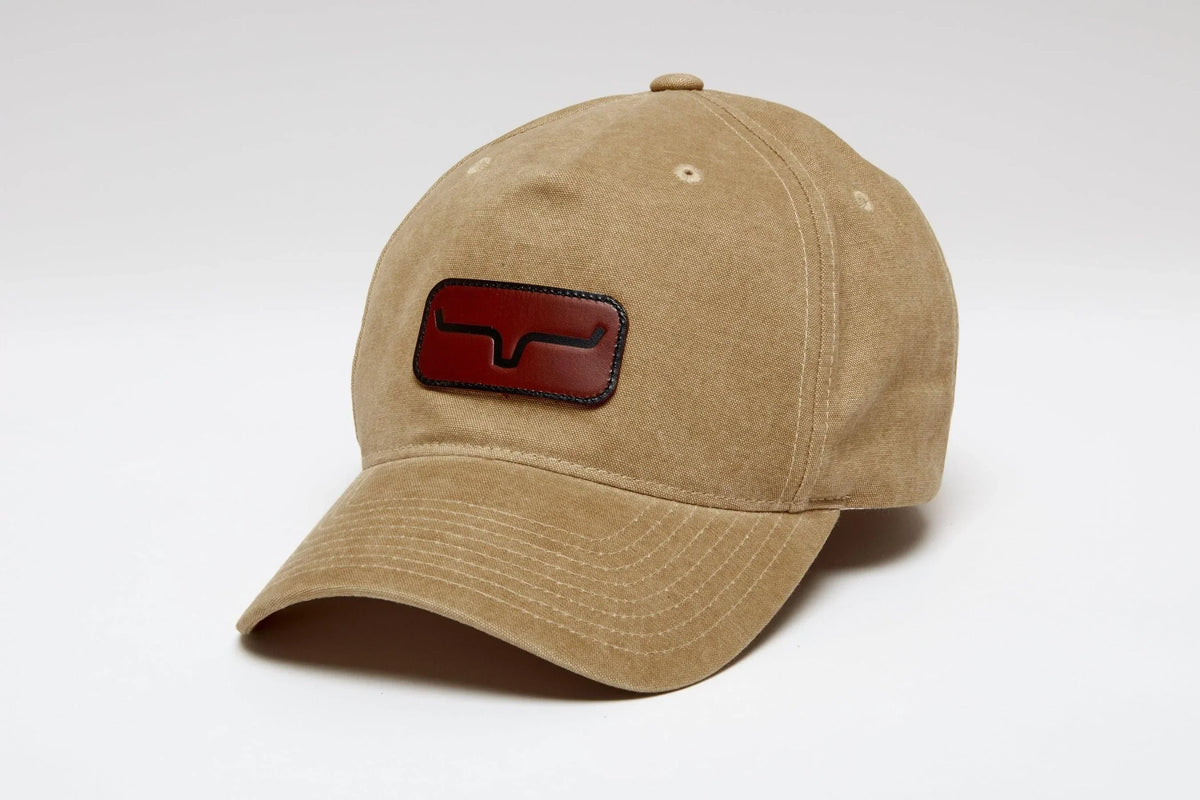 Kimes Ranch Vanguard Hat in Maize, side view, with a red Kimes Ranch logo patch