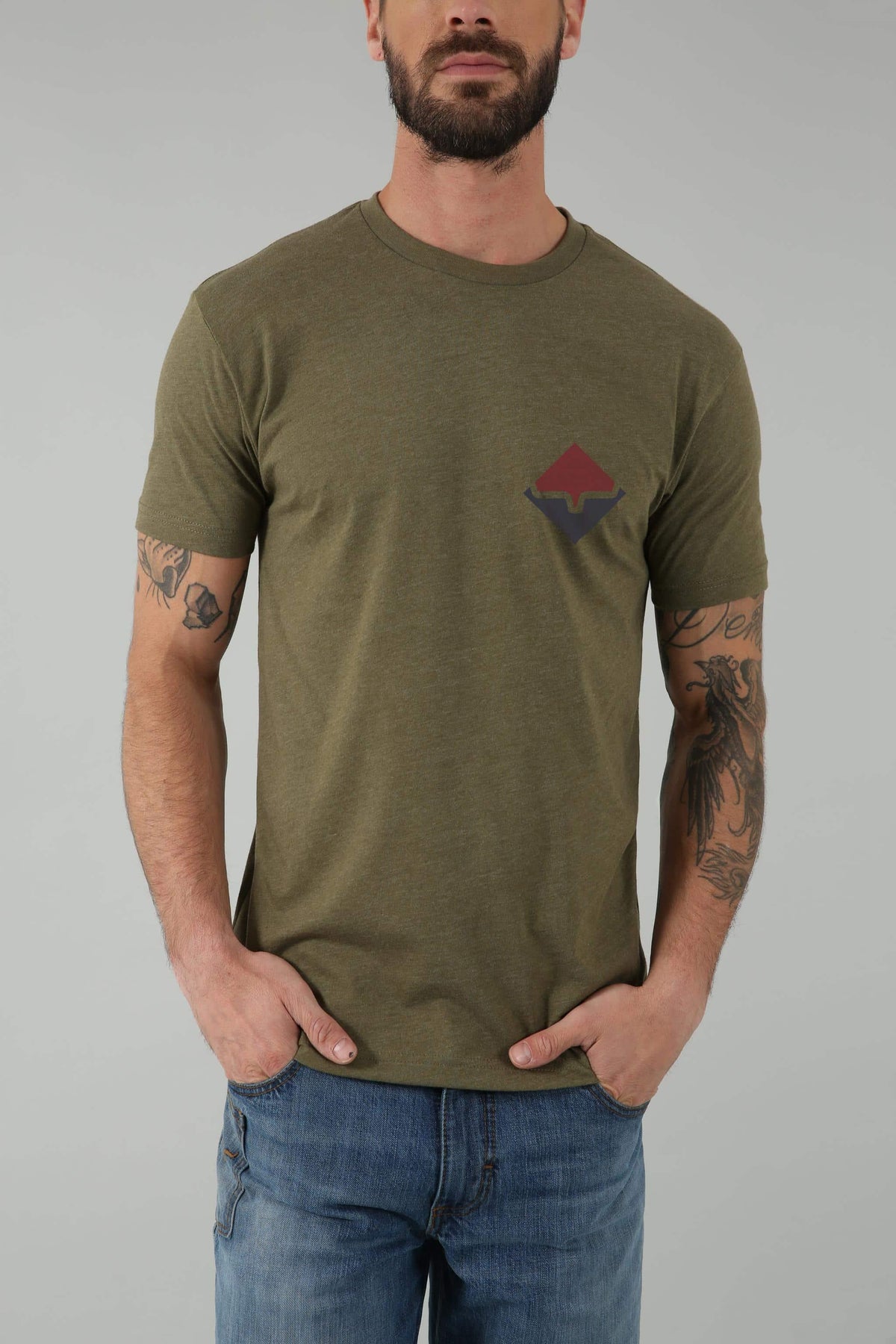 Kimes Ranch Warmth Shirt in Army with a red and blue geometric logo on the chest