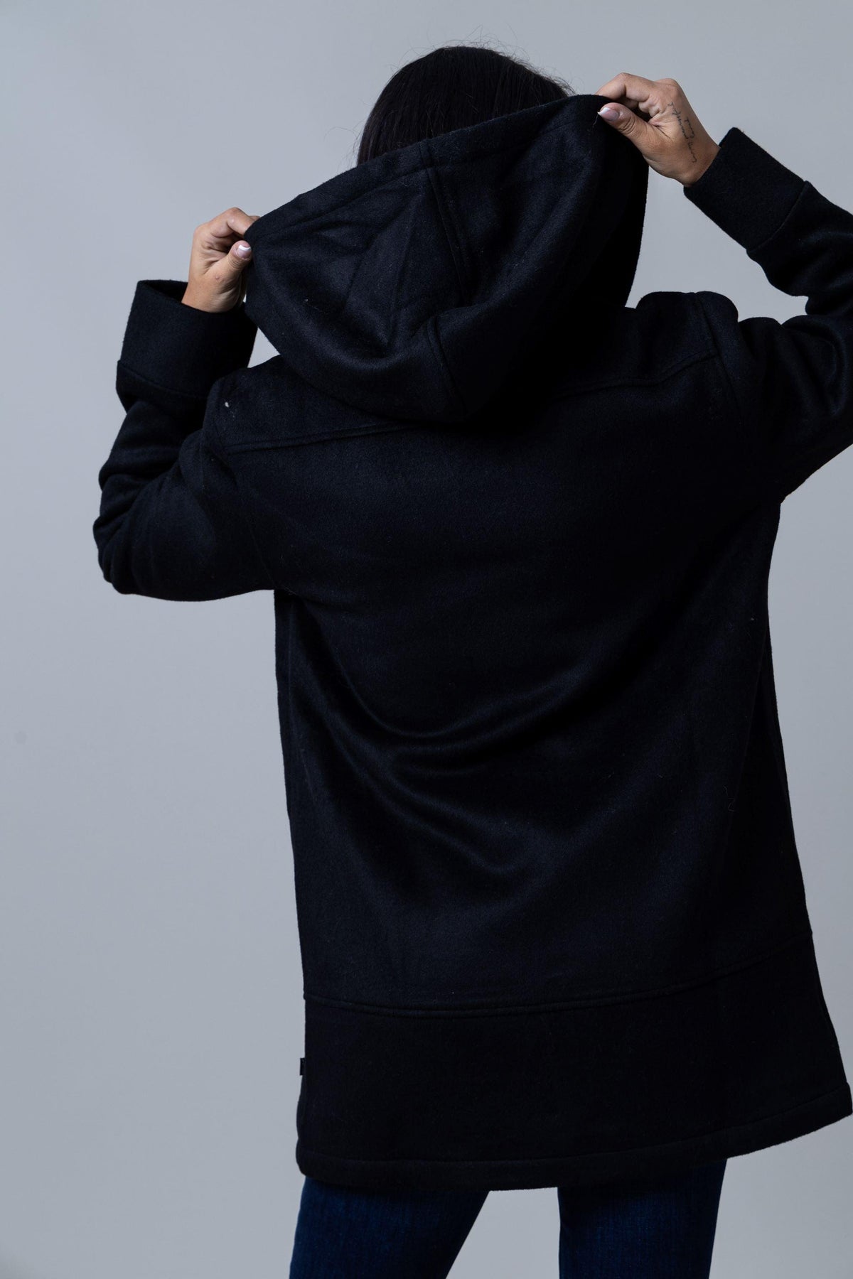 Kimes Ranch Tatum Coat in Black, back view, with a hood and long sleeves