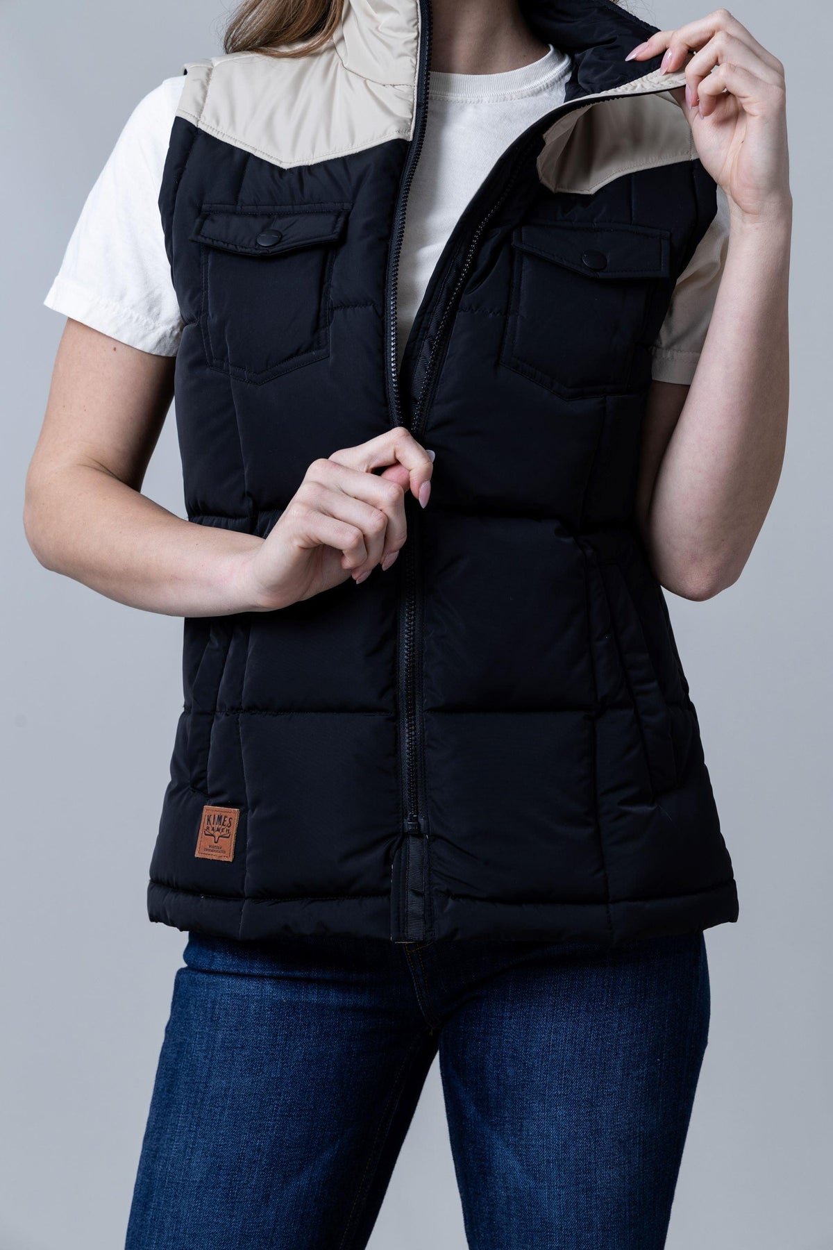 Kimes Ranch Wyldfire Vest in Black with a tan collar and front pockets