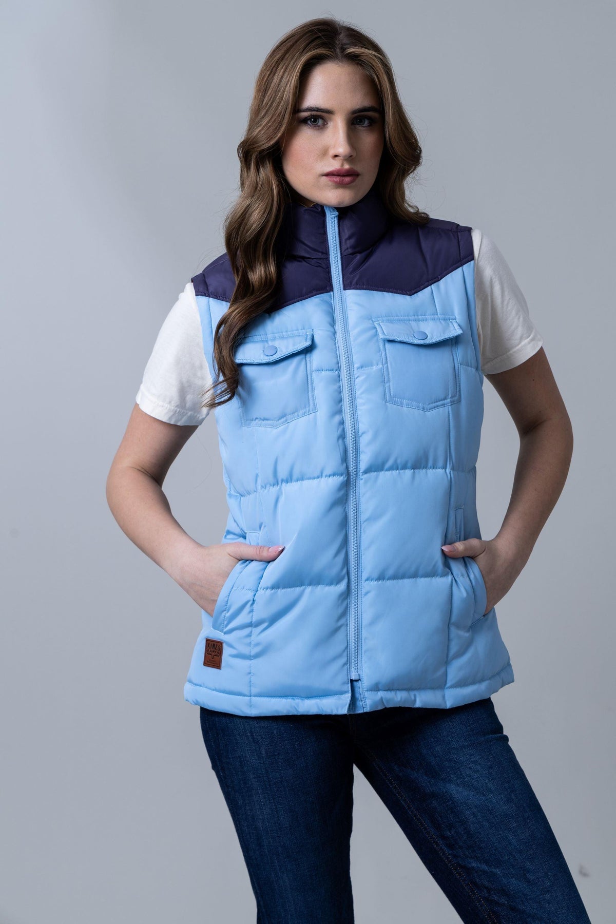 Kimes Ranch Wyldfire Vest in Sky Blue with navy yoke, two chest pockets, and side zip pockets