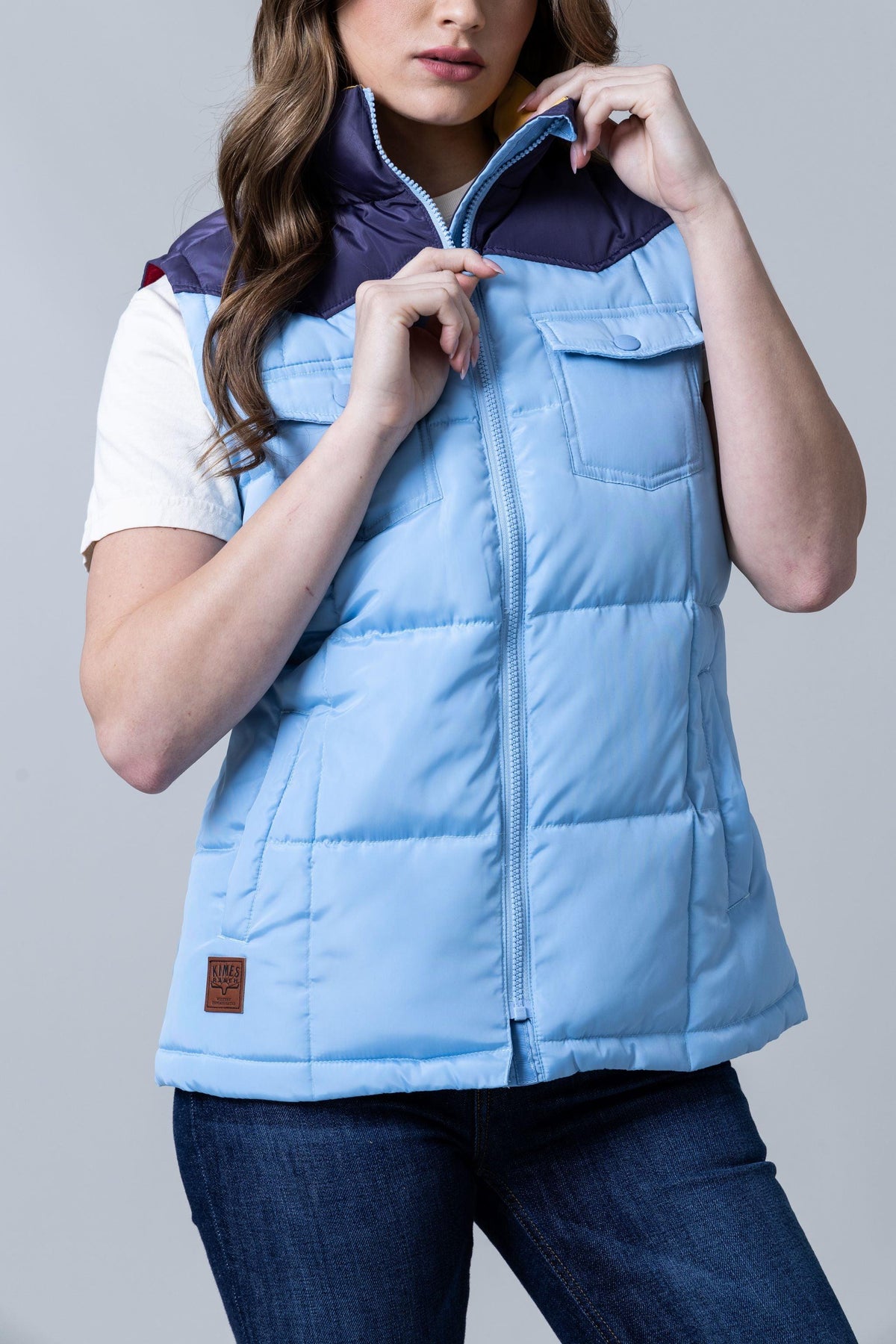 Kimes Ranch Wyldfire Vest in Sky Blue with a navy collar and front flap pockets