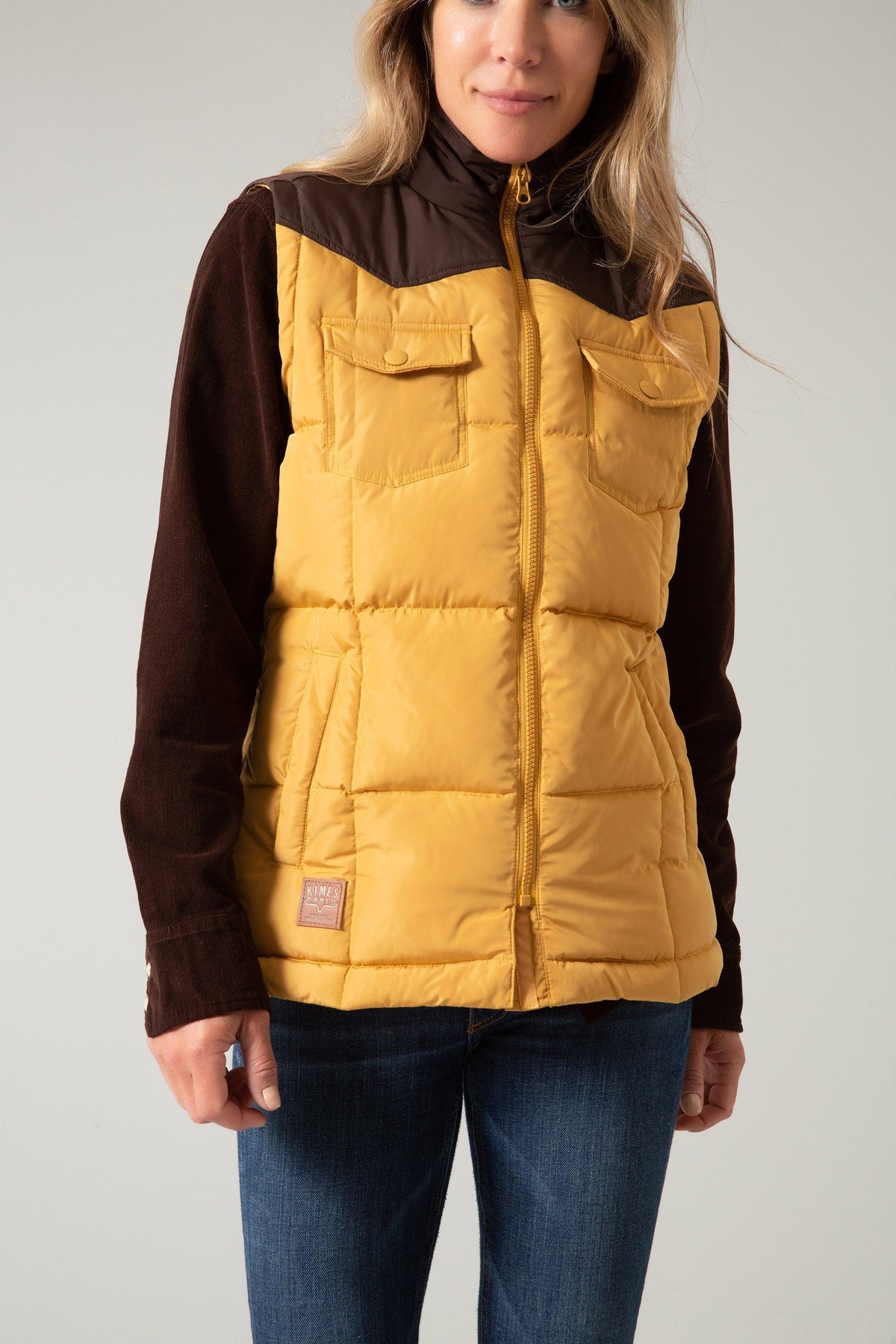 Kimes Ranch Wyldfire Vest in Mustard with brown sleeves and front pockets