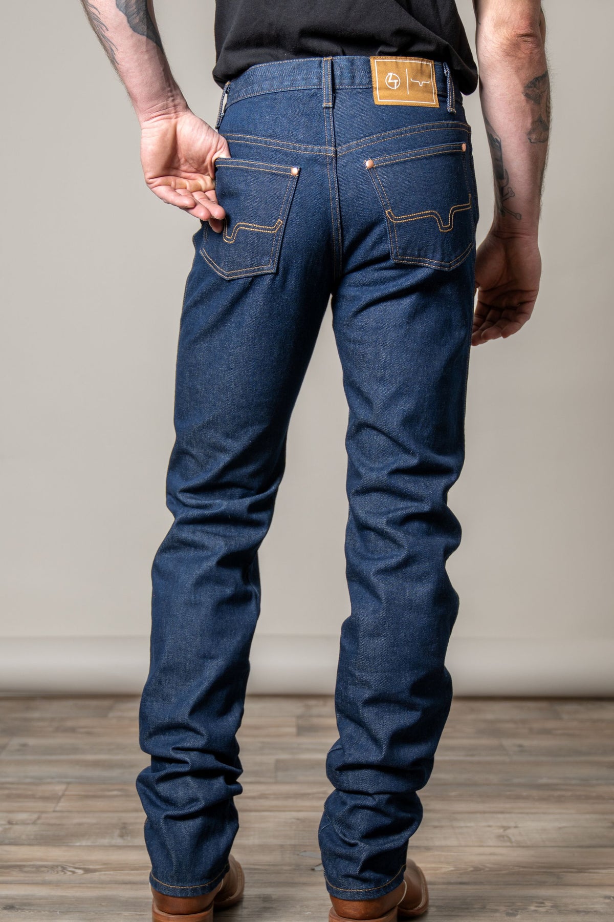 Kimes Ranch ZT jeans in Dark Wash, back view, with signature back pocket stitching and logo patch