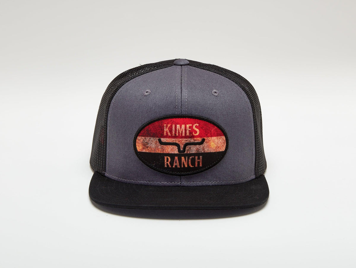 Kimes Ranch American Standard Trucker Hat in charcoal with a mesh back and front Kimes Ranch logo patch