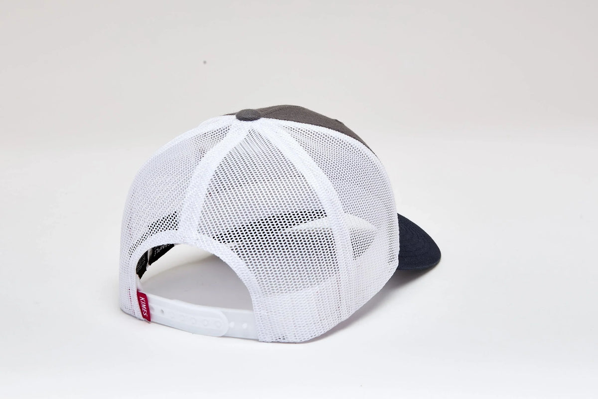 Kimes Ranch American Trucker Hat in Charcoal, back view, with white mesh back and plastic snap closure
