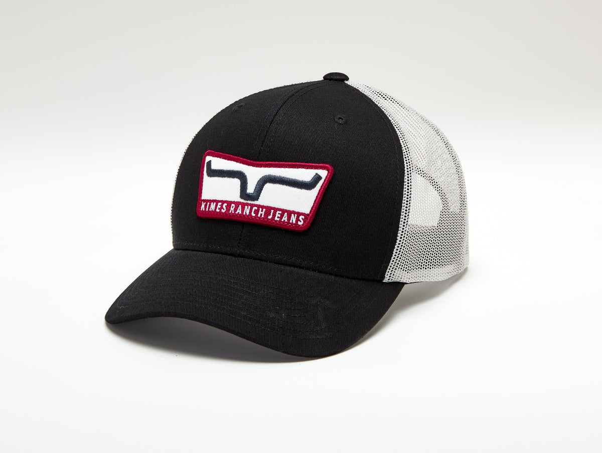 Kimes Ranch Extra Crunchy Hat in Black with a front embroidered logo patch and white mesh back panels