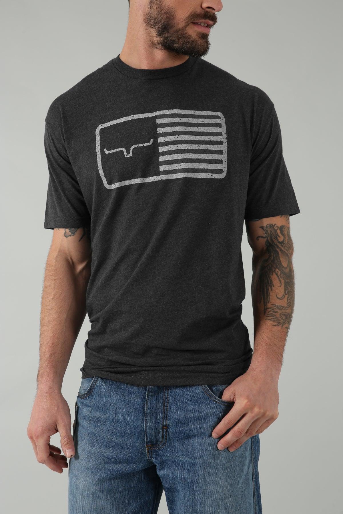 Kimes Ranch American Trucker Tee Shirt in Charcoal Heather with a distressed flag graphic featuring the Kimes Ranch logo