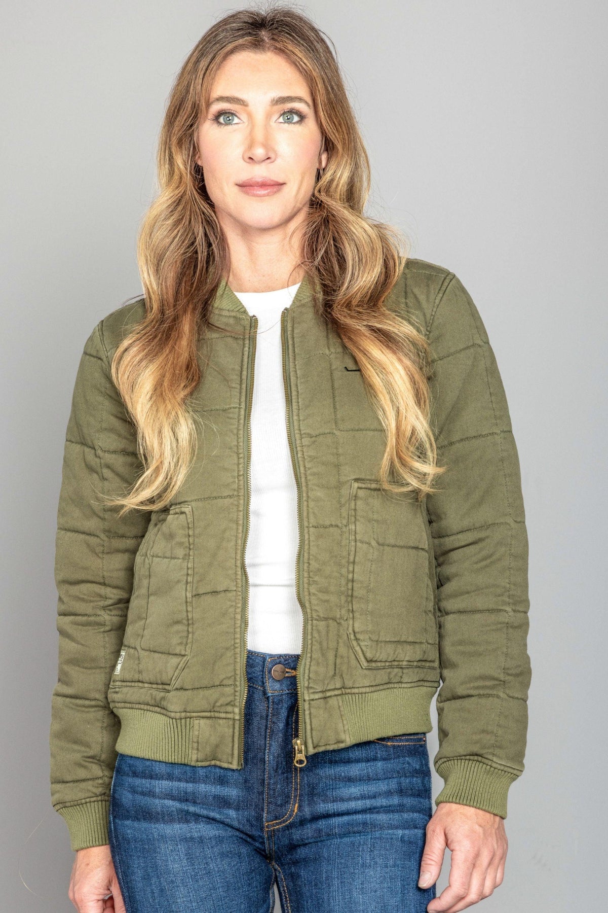 Kimes Ranch Bronc Bomber Jacket in Sage with a quilted design, front zip, and ribbed cuffs