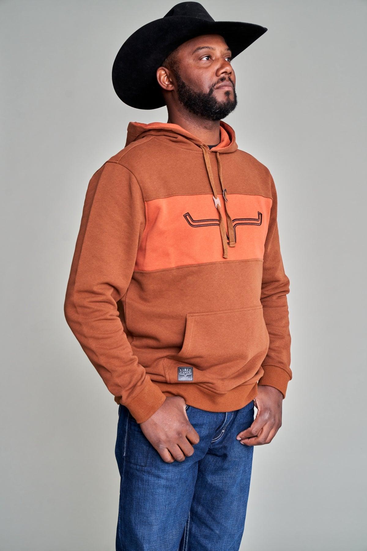 Kimes Ranch Fast Talker Hoodie in Brown, side view, with a colorblock chest panel and Kimes Ranch logo
