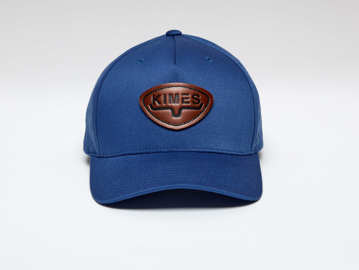 Kimes Ranch Fender Hat in blue with a brown Kimes Ranch logo patch on the front