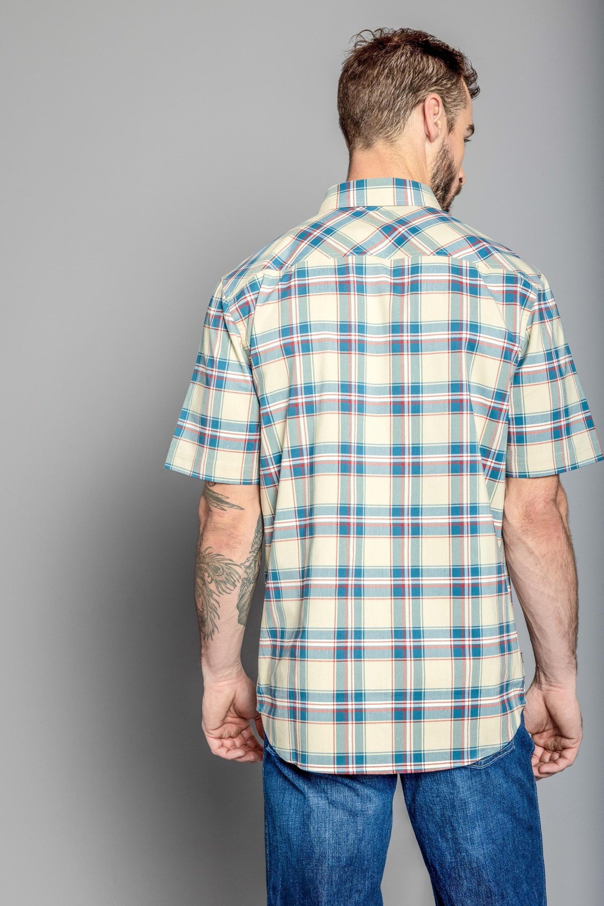 Kimes Ranch 4 Stroke Plaid Dress Shirt in Dark Blue, back view, with short sleeves and a plaid pattern