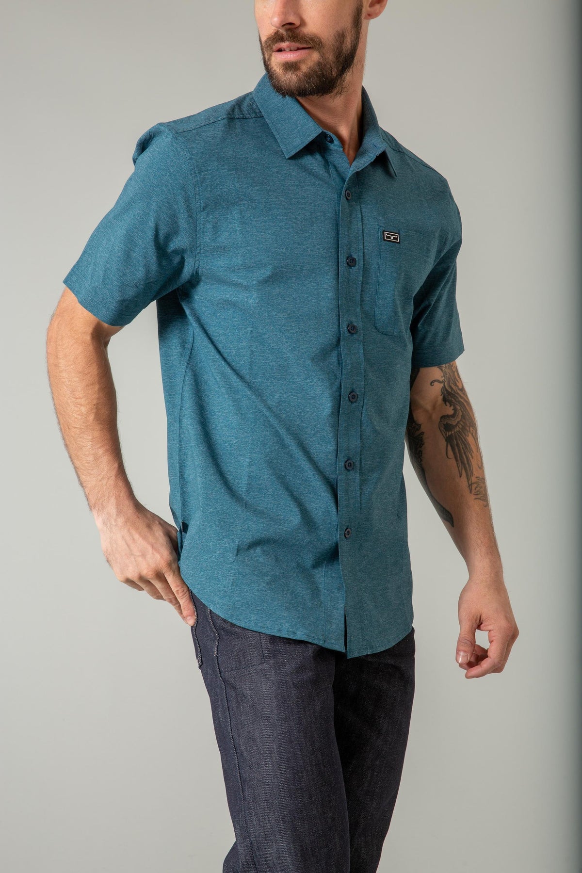 Kimes Ranch Linville Short Sleeve Dress Shirt in Dark Blue with a chest pocket and logo