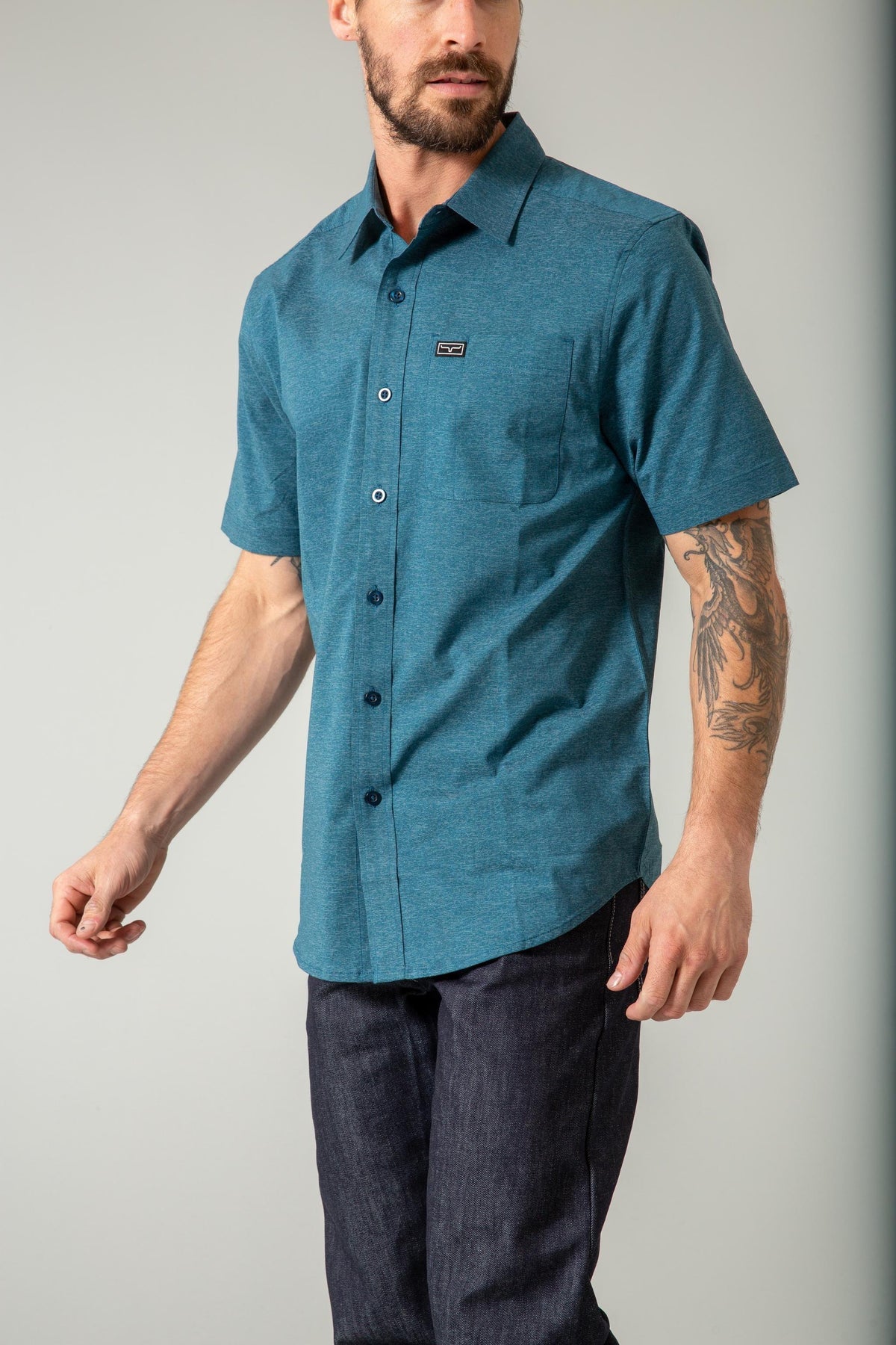 Kimes Ranch Linville Short Sleeve Dress Shirt in Dark Blue with a chest pocket and logo