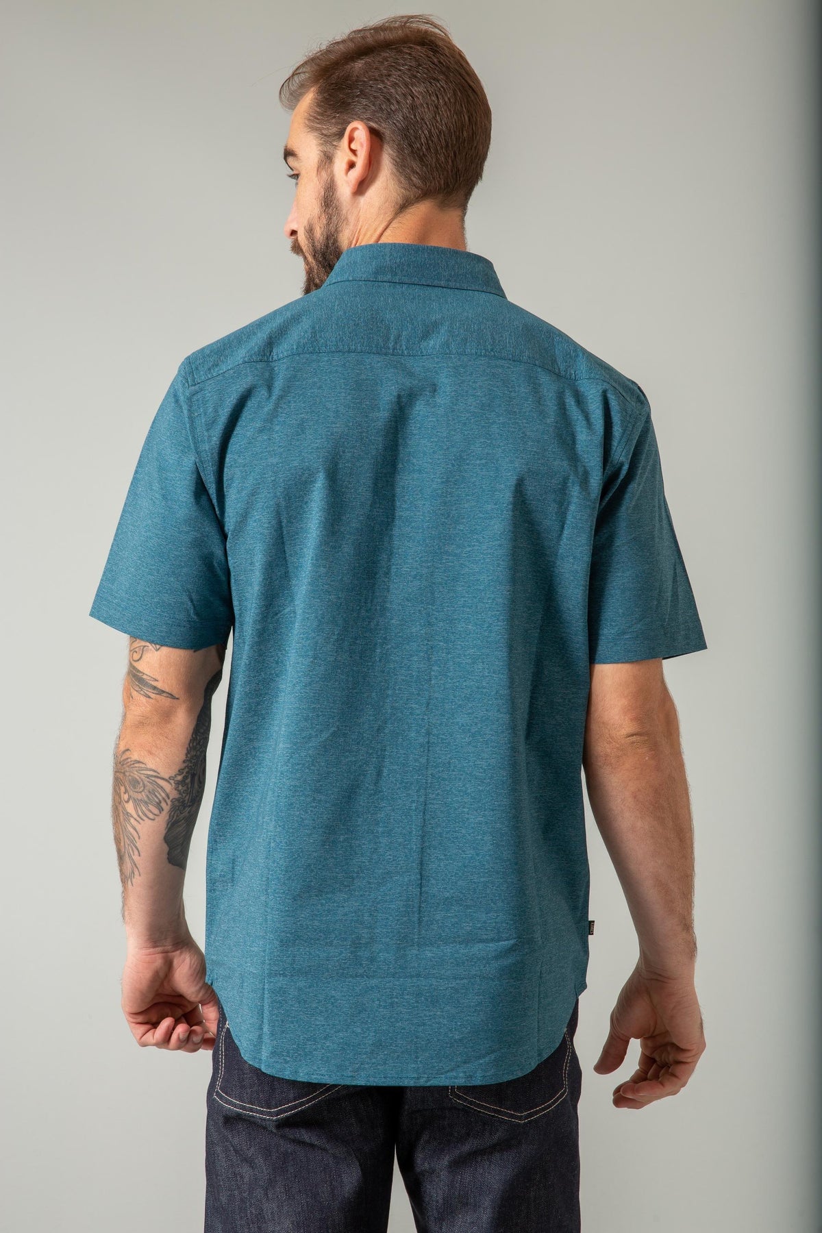 Kimes Ranch Linville Short Sleeve Dress Shirt in Dark Blue, back view, with a back yoke and short sleeves