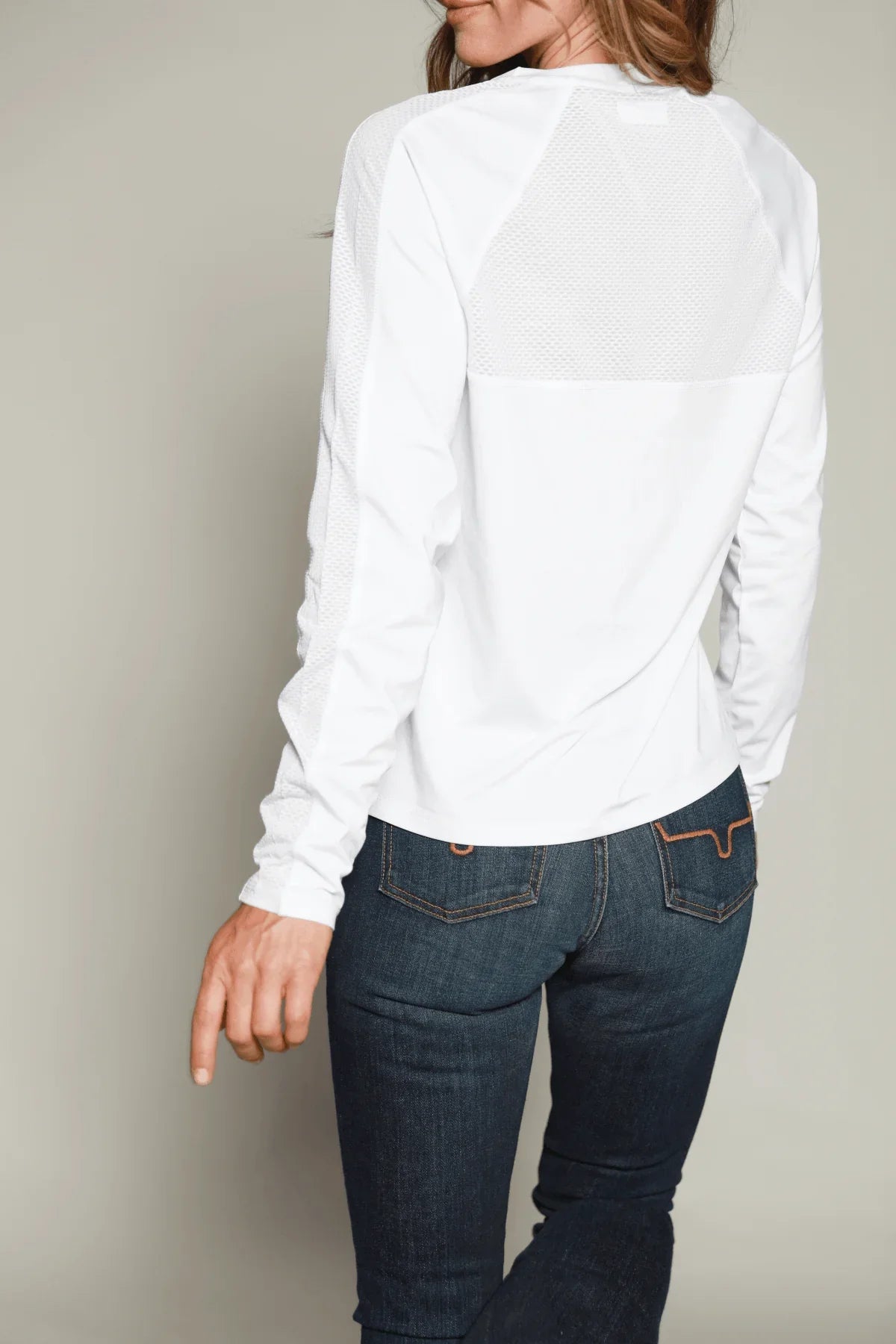 Kimes Ranch K1 Ls Tech Tee Shirt in White, back view, with a mesh back yoke and long sleeves