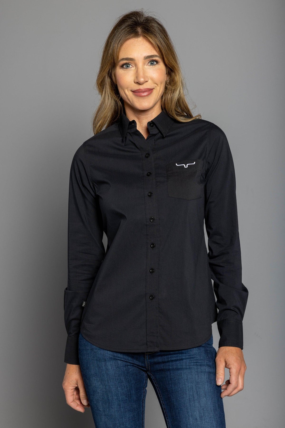 Kimes Ranch Ladies KR Team Shirt (Long) in Black with a button front and chest pocket with the Kimes Ranch logo