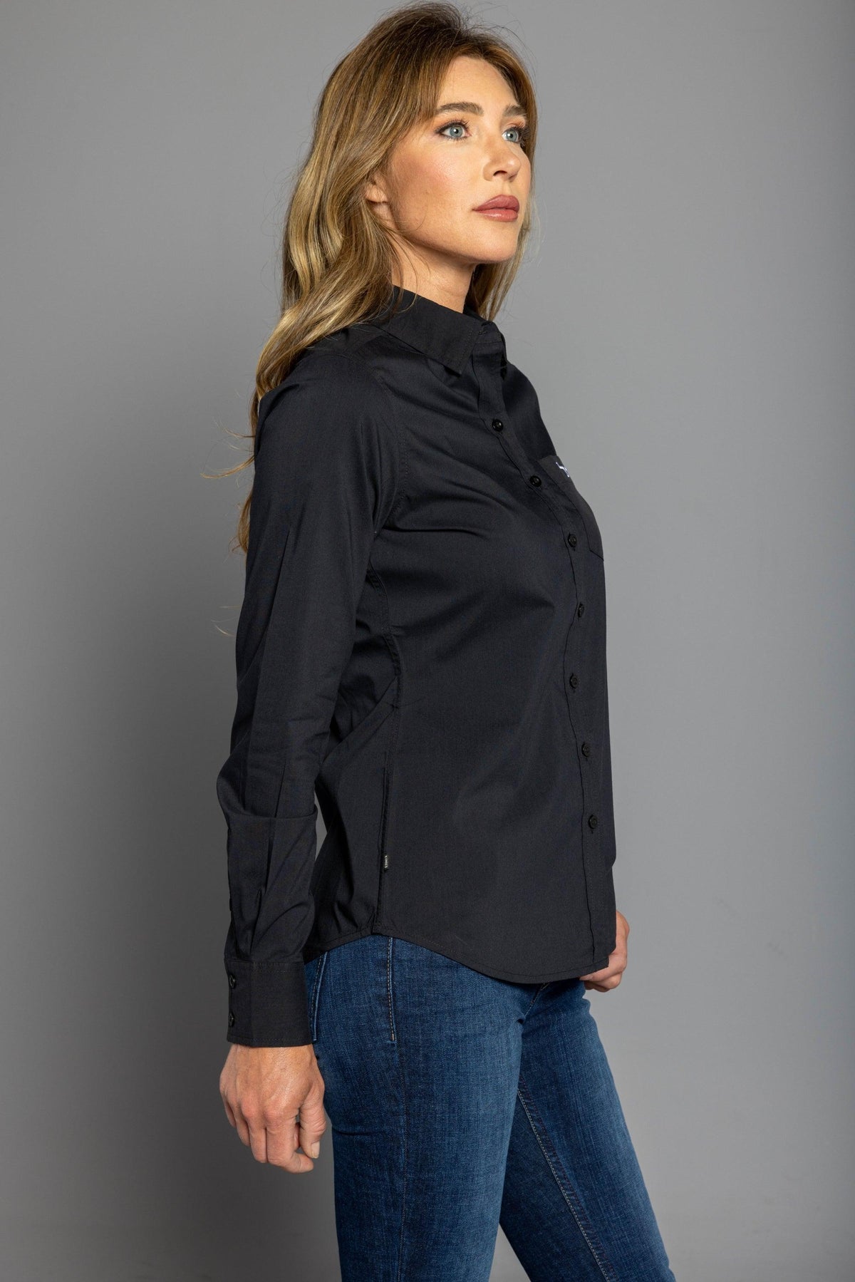 Kimes Ranch Ladies KR Team Shirt (Long) in Black, side view, with the button-front and long sleeves